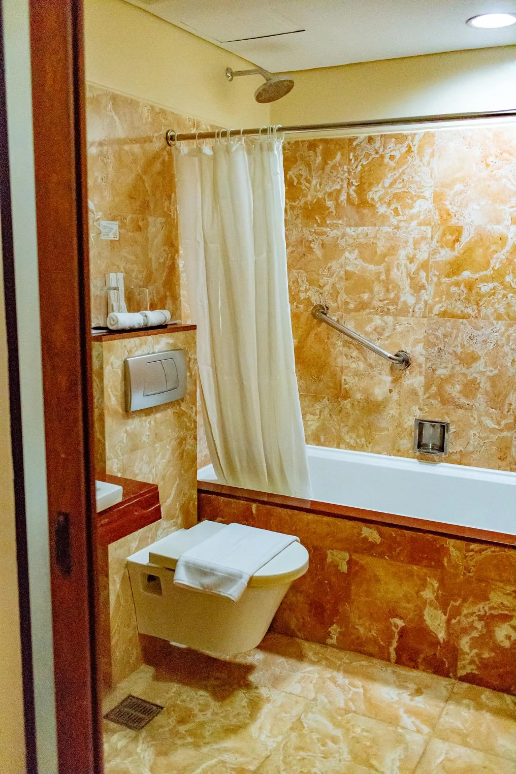 Shower in Crown Regency Beach Resort