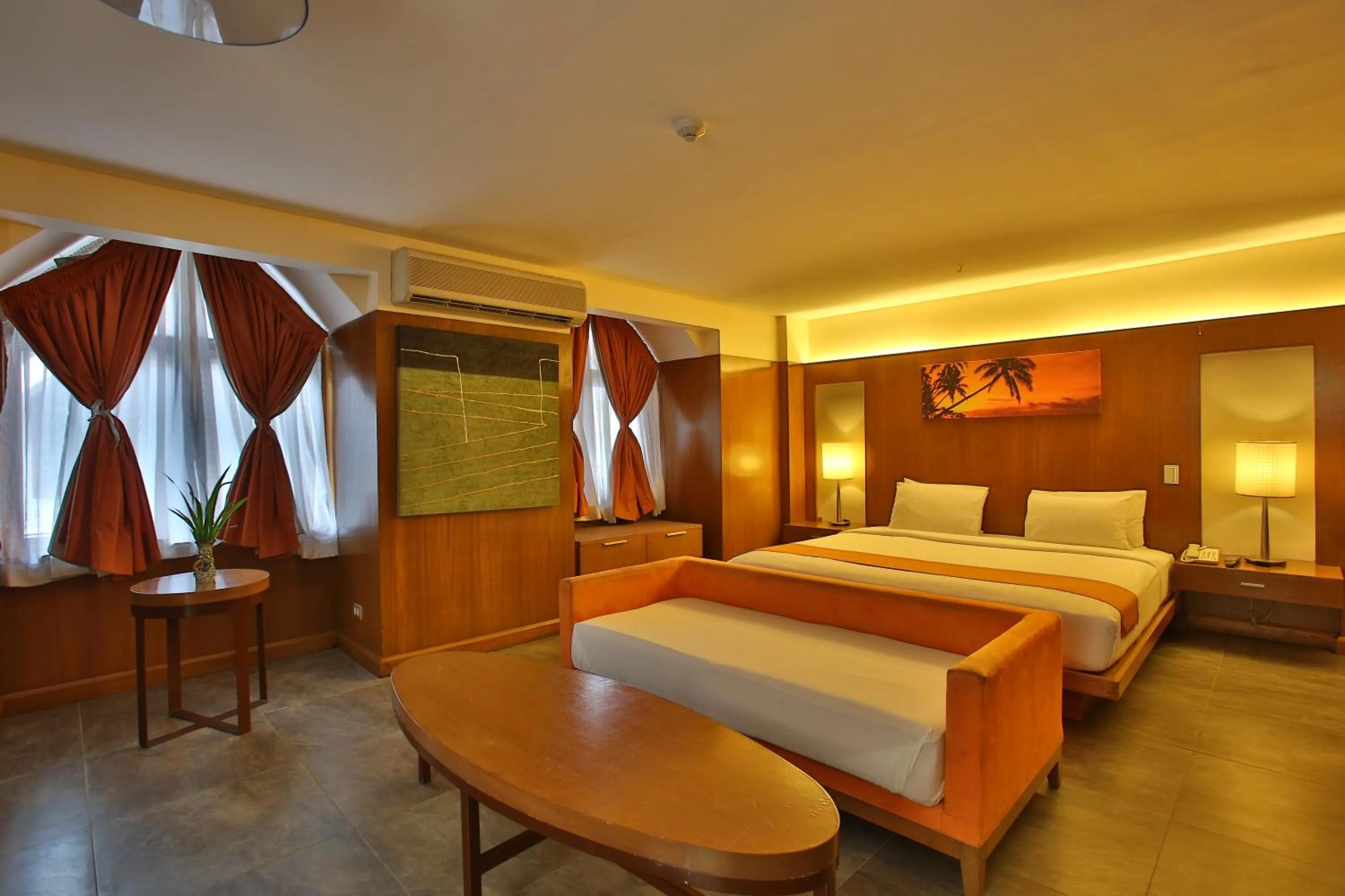 Bed in Crown Regency Beach Resort