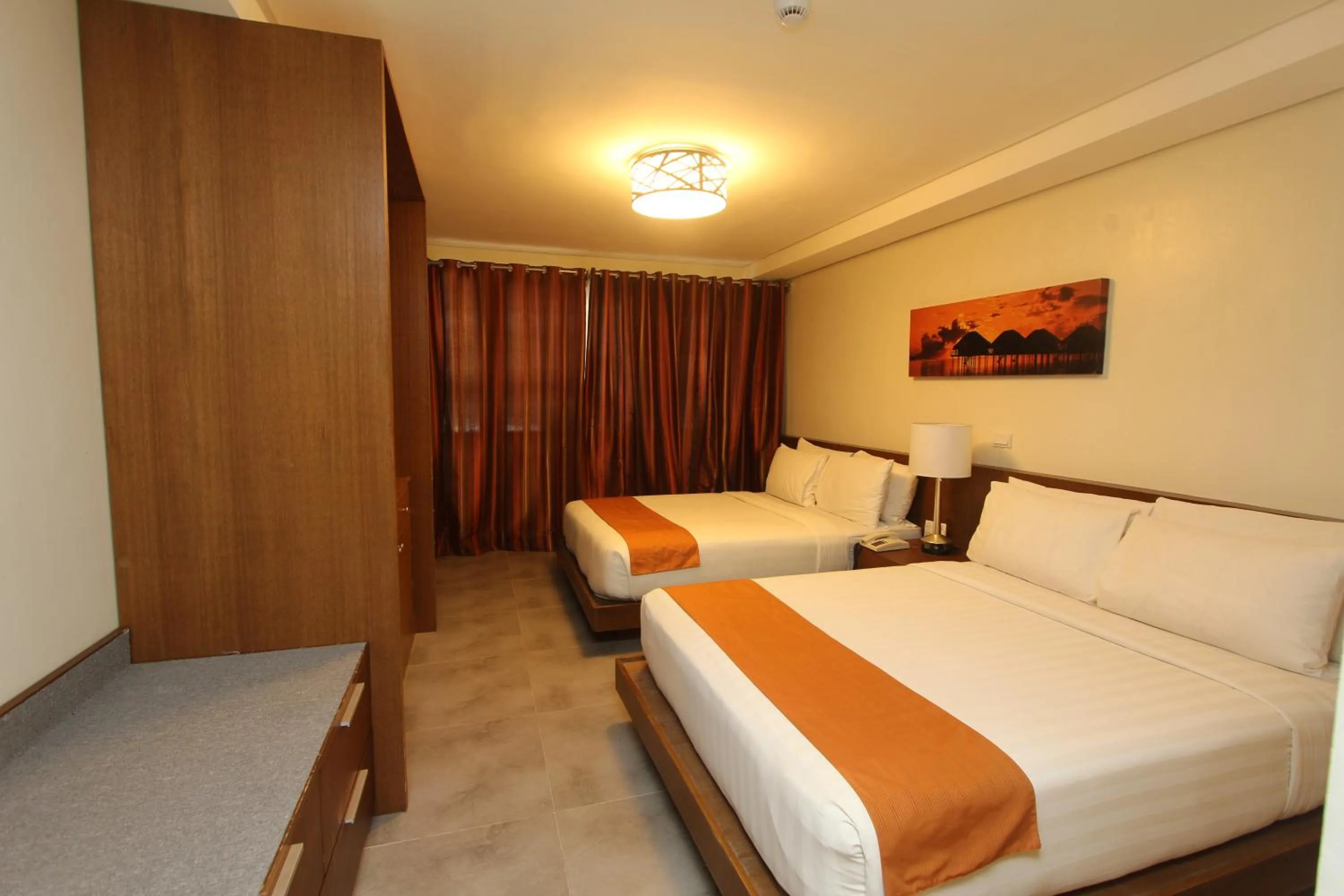 Bedroom, Bed in Crown Regency Beach Resort