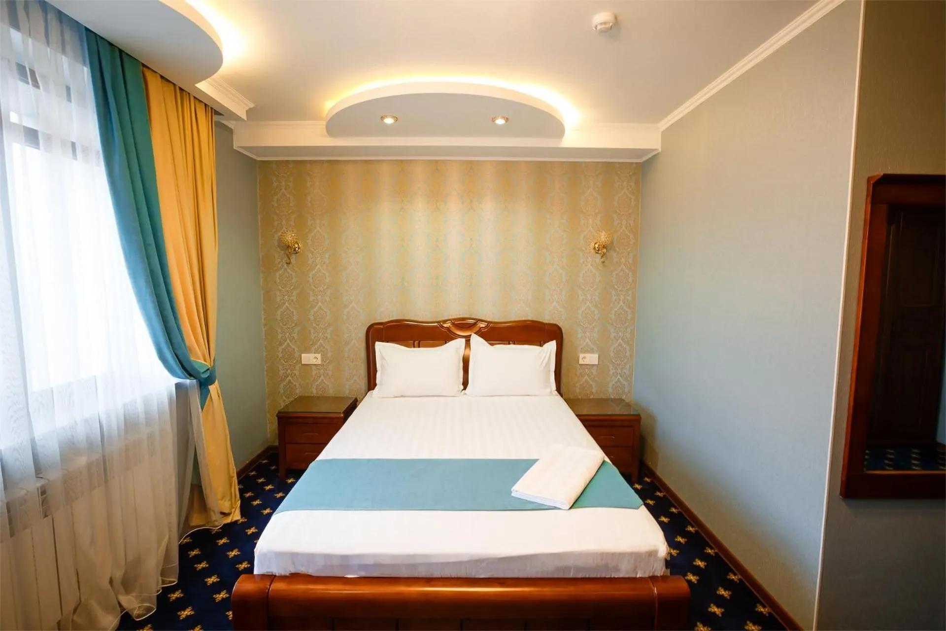 Bed in Salut Hotel Almaty