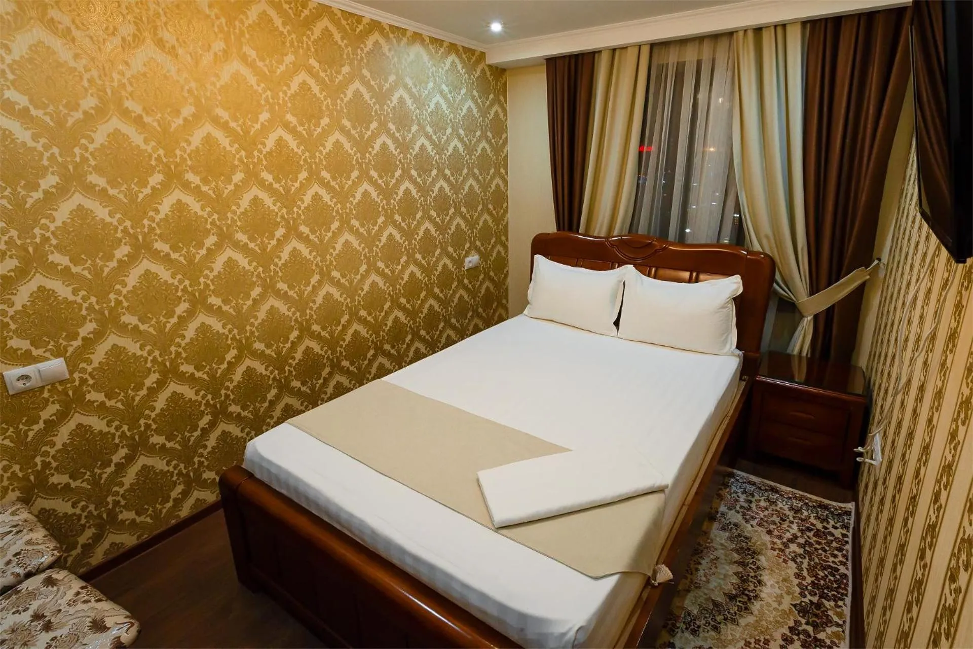 Bed in Salut Hotel Almaty