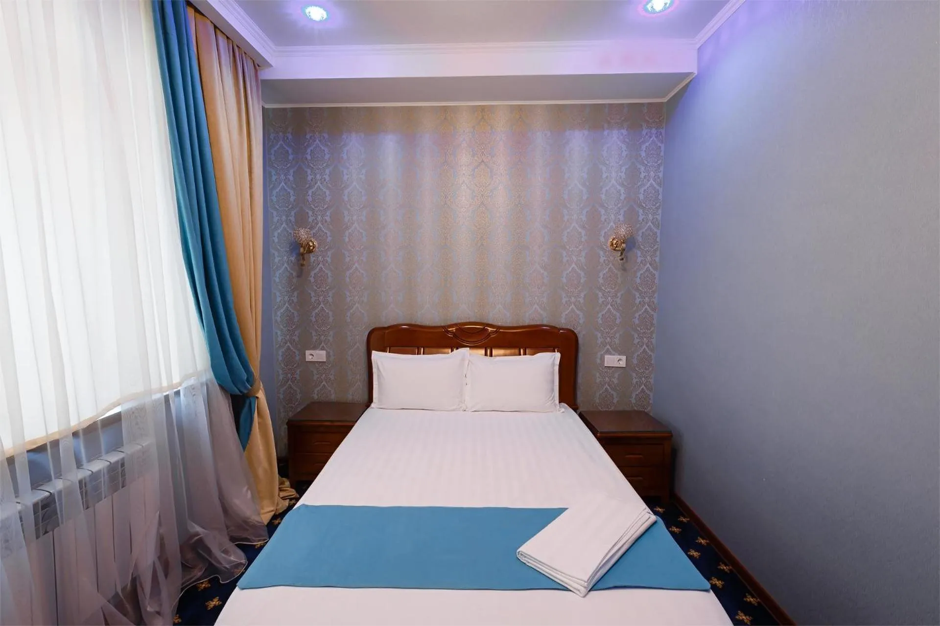 Bed in Salut Hotel Almaty