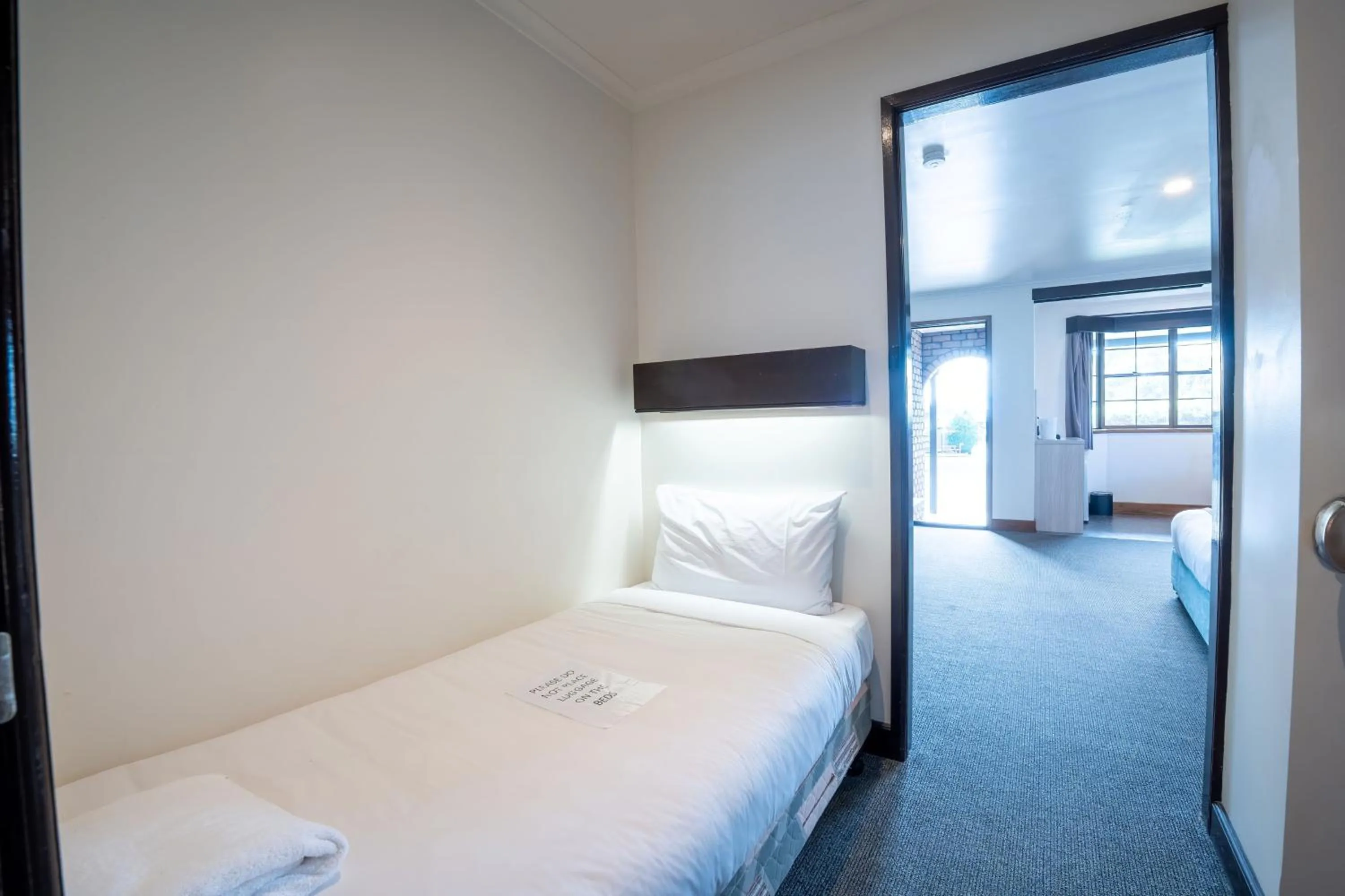 Bed in Olde Tudor Hotel