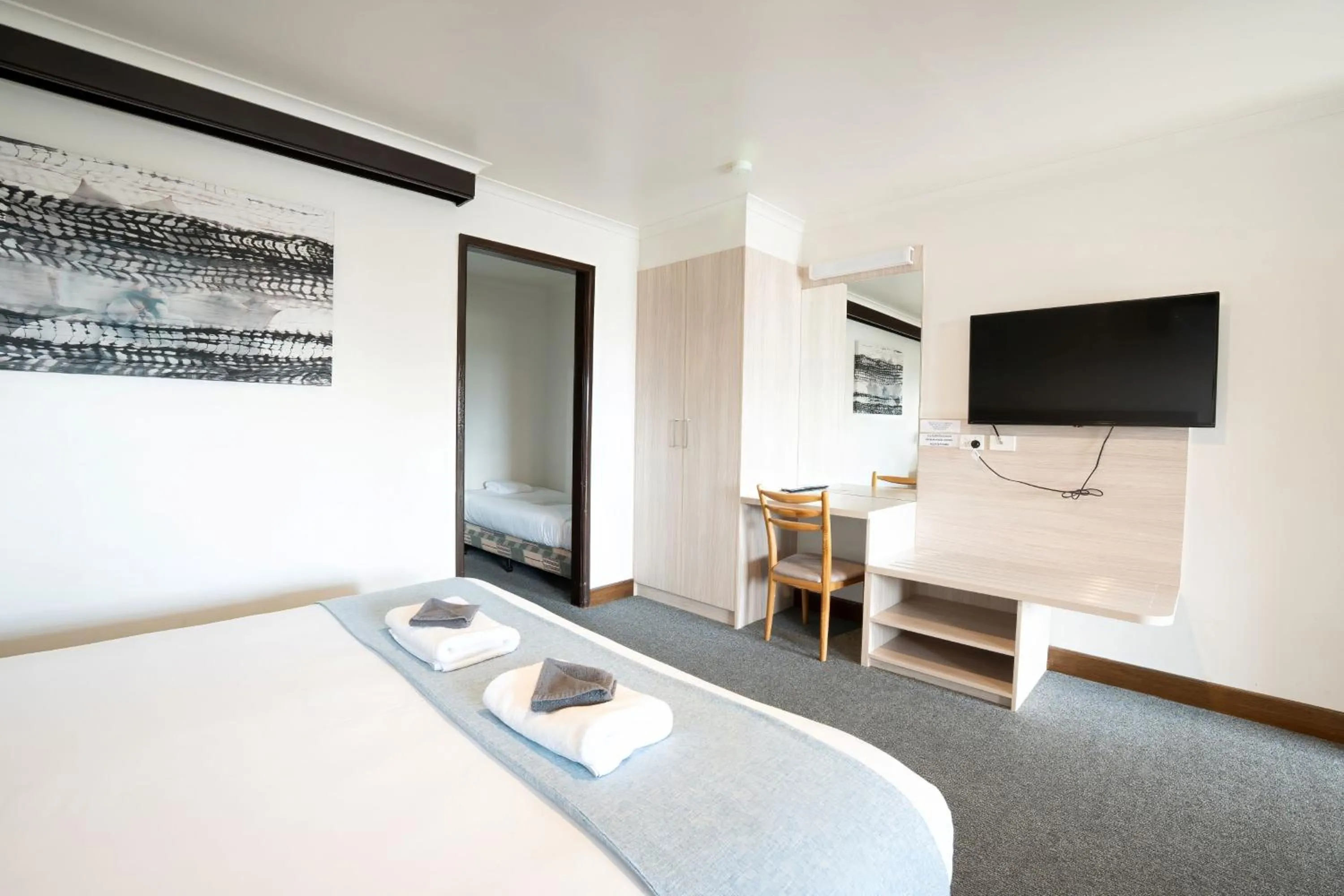 Bed in Olde Tudor Hotel