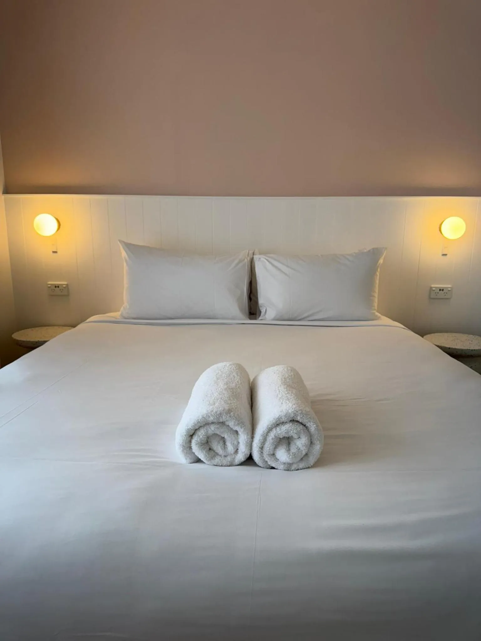 Bed in ASURE Fountain Resort Motel