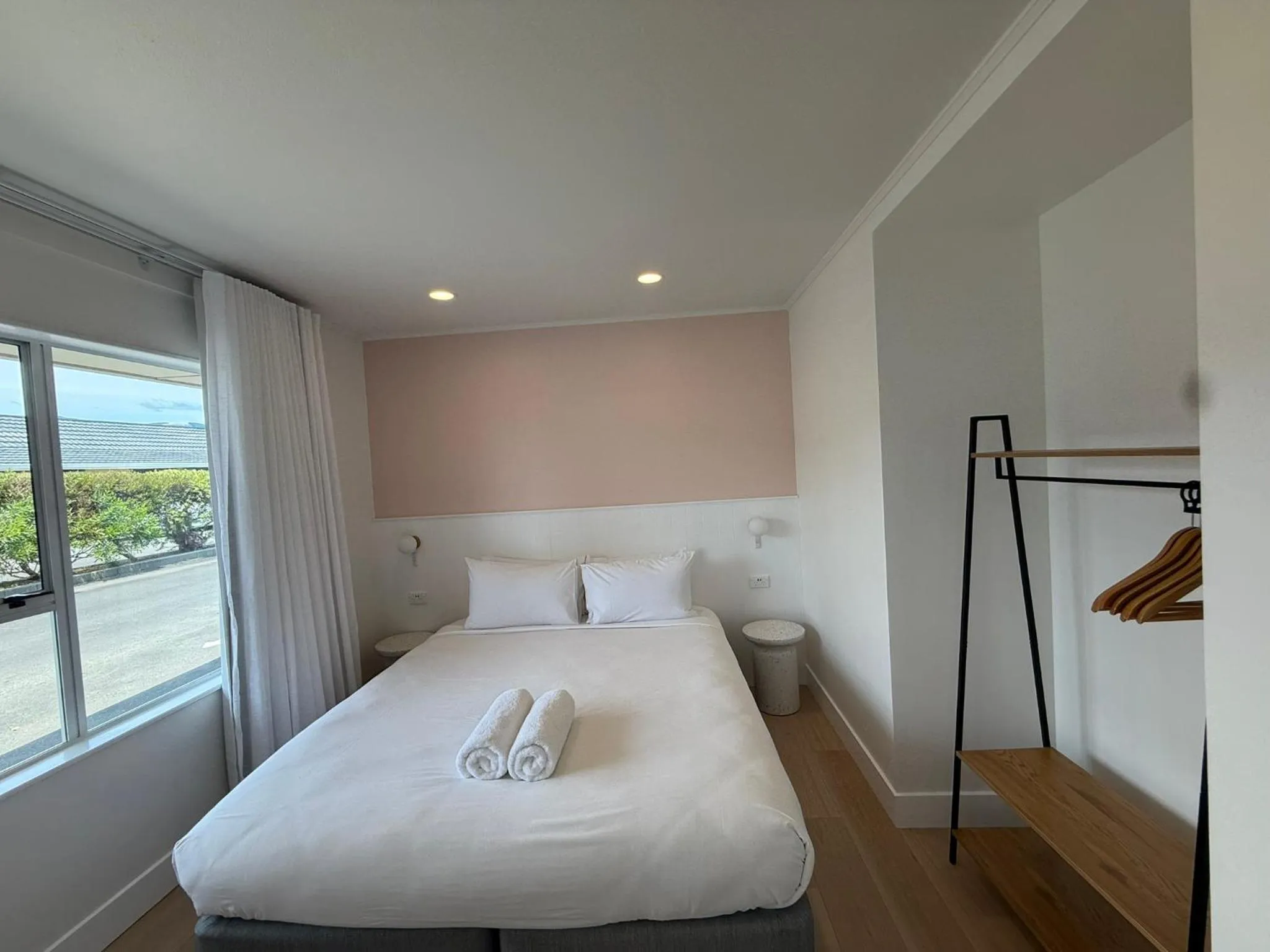 Bed in ASURE Fountain Resort Motel