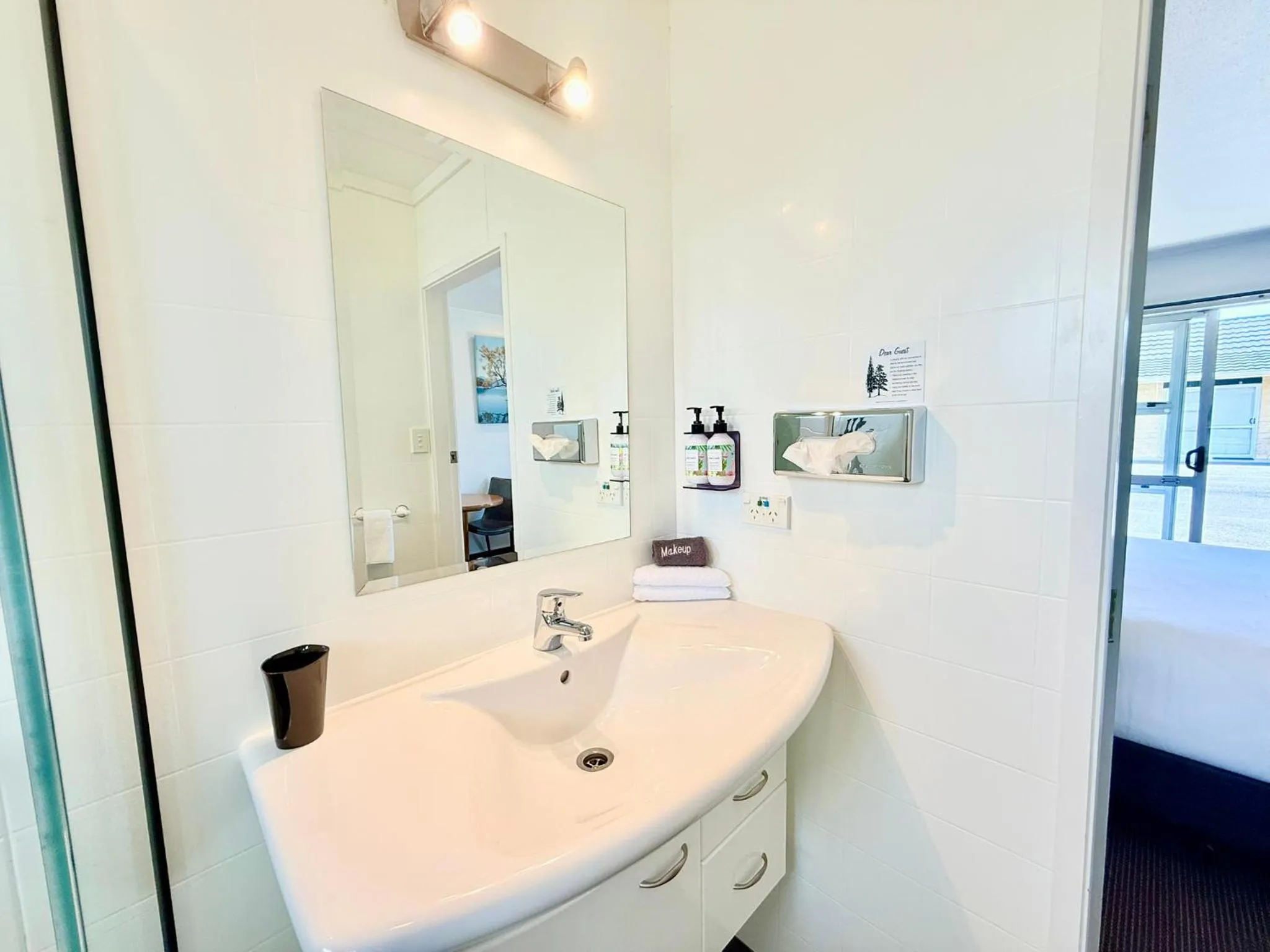 Bathroom in ASURE Fountain Resort Motel