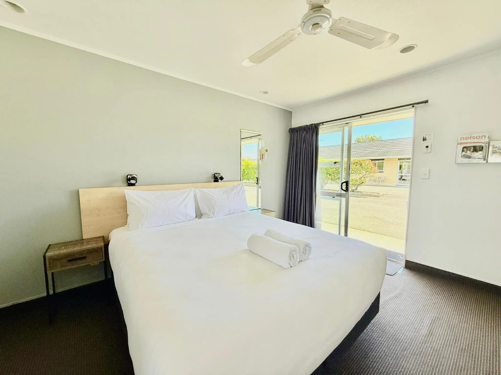 Bed in ASURE Fountain Resort Motel