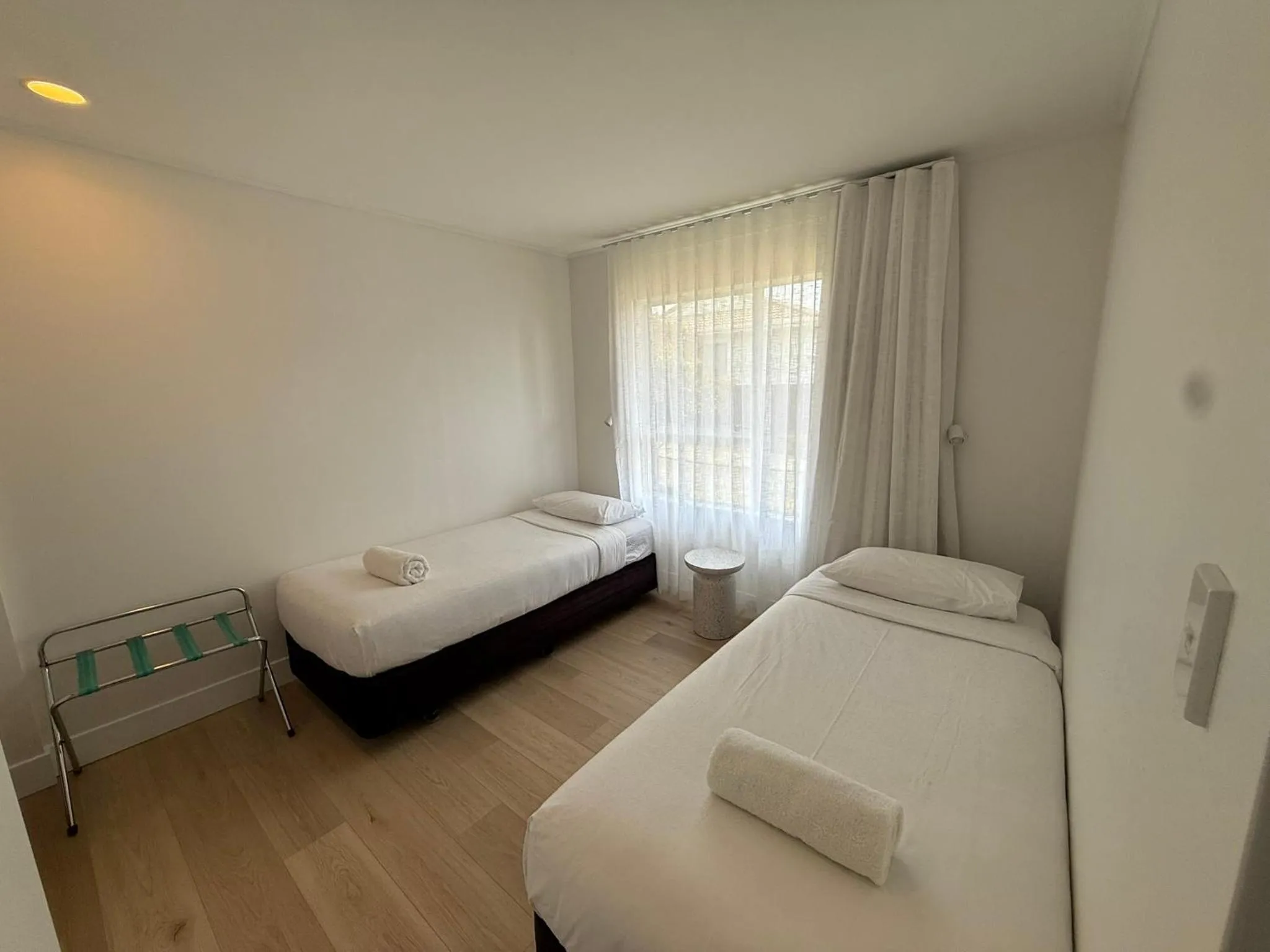 Bed in ASURE Fountain Resort Motel