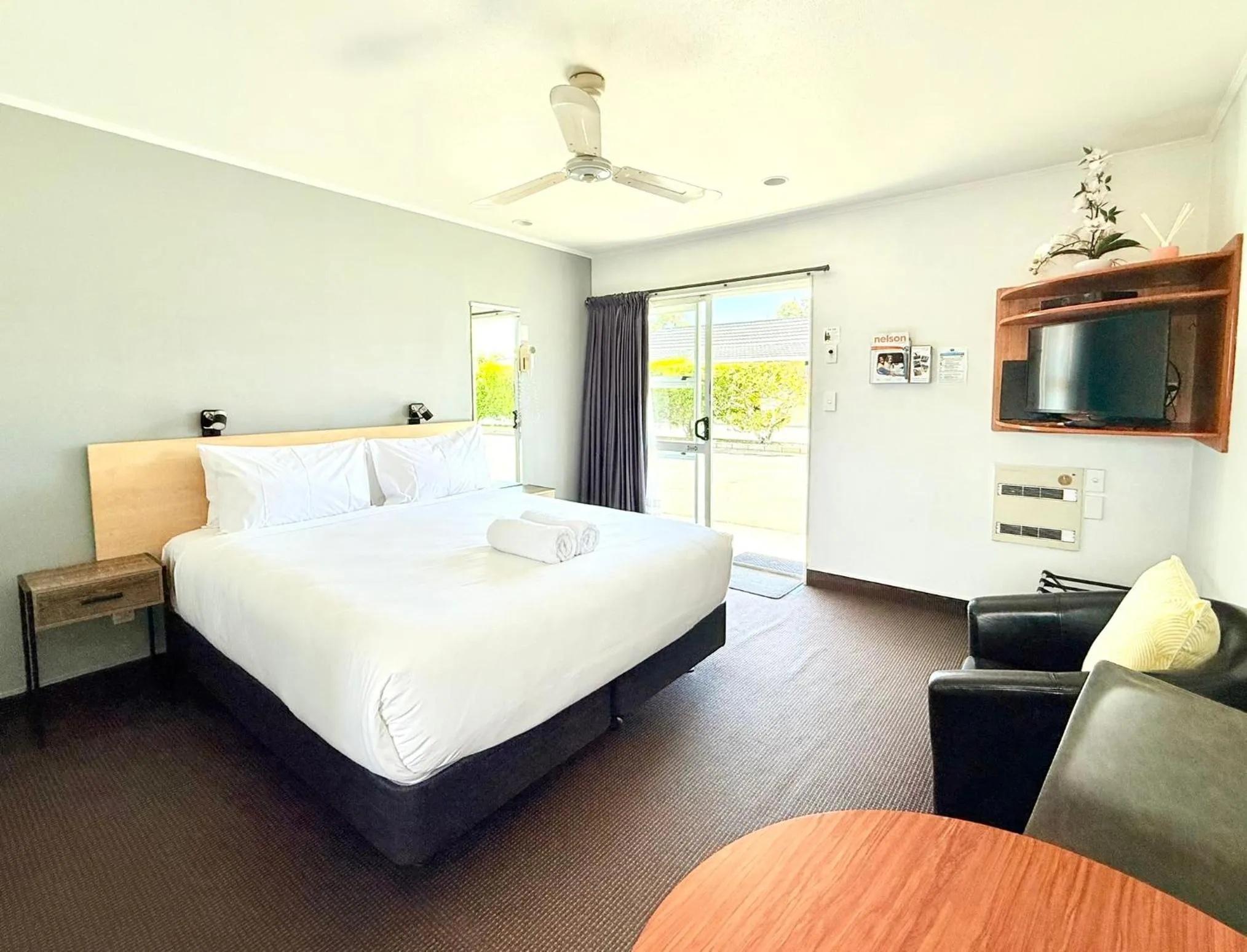 Bed in ASURE Fountain Resort Motel