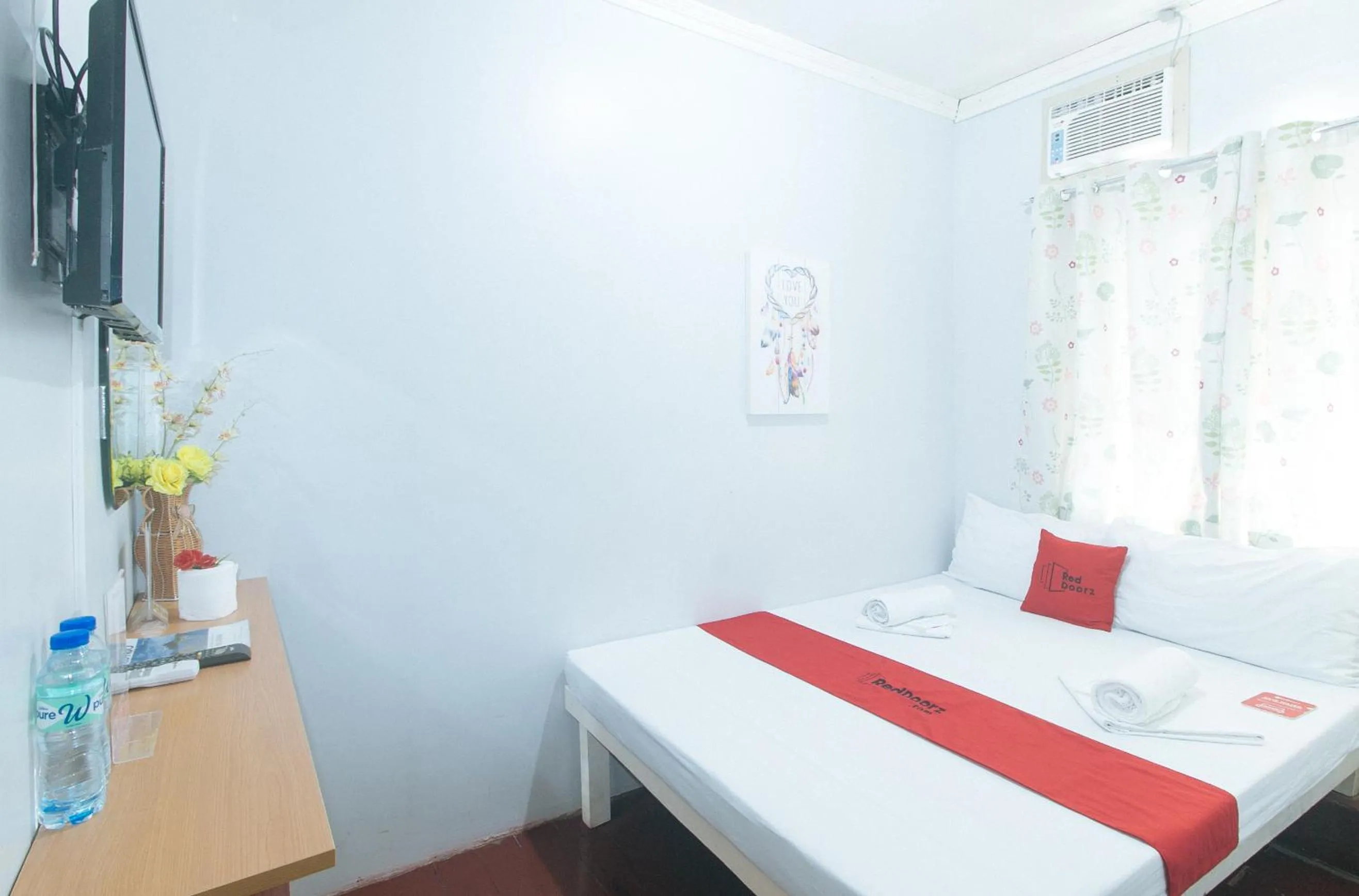 Bed in RedDoorz at Bunakidz Lodge El Nido Palawan