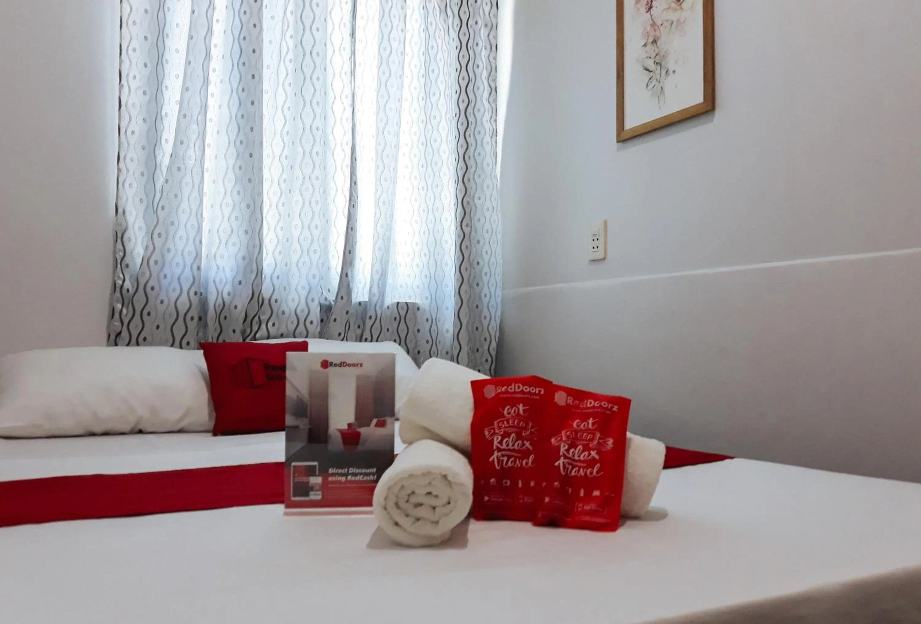 Bed in RedDoorz at Bunakidz Lodge El Nido Palawan