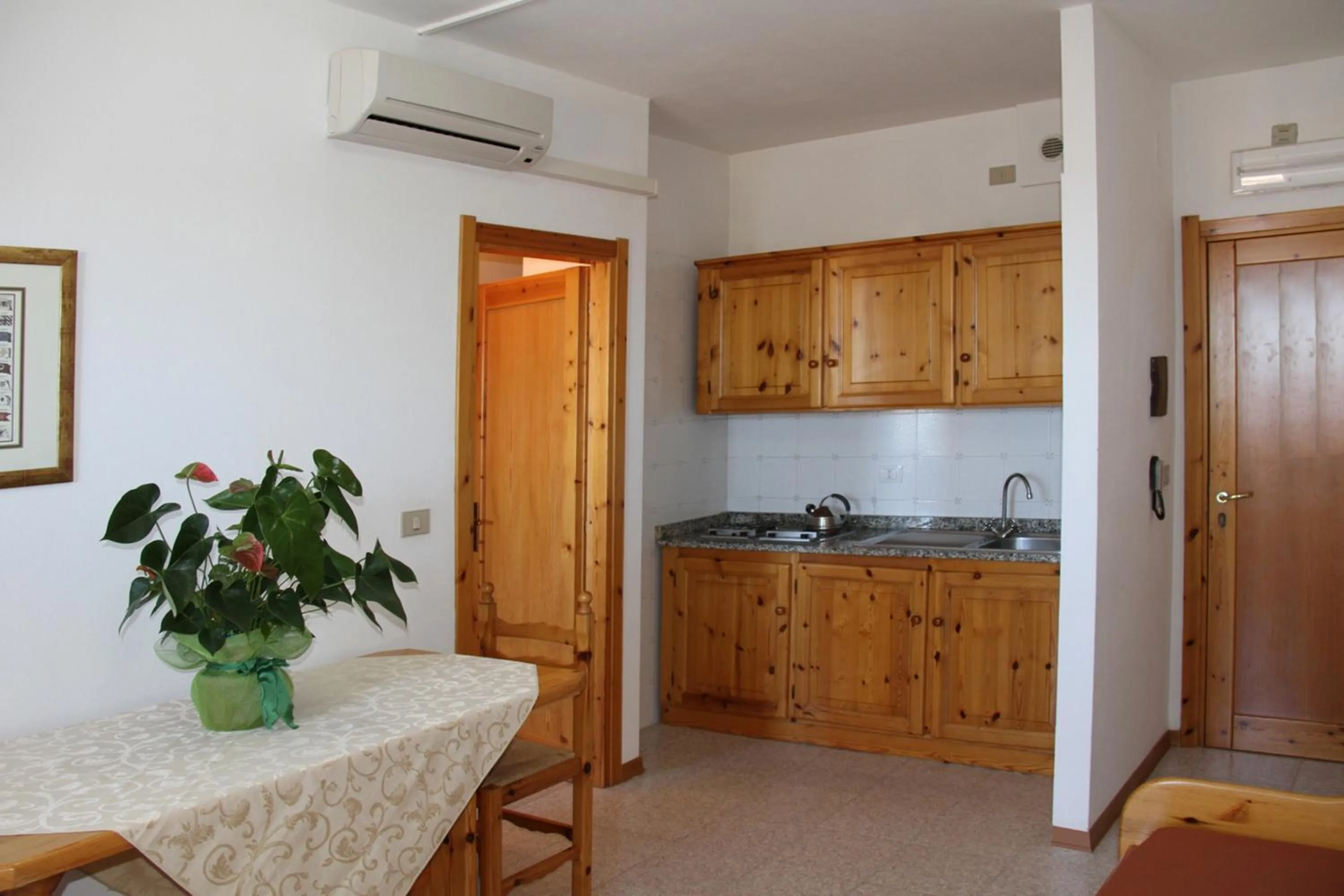 Kitchen or kitchenette in Gardenia Casa Vacanze