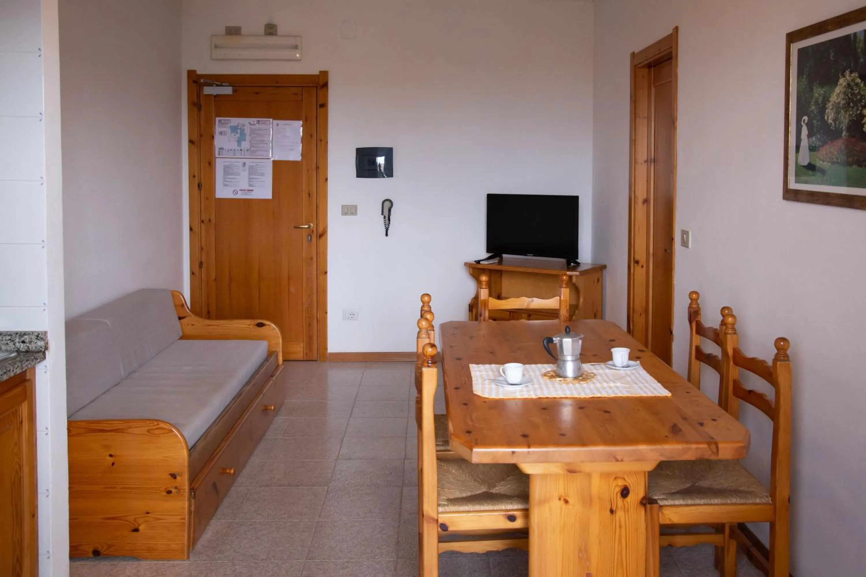 Living room, Bed in Gardenia Casa Vacanze