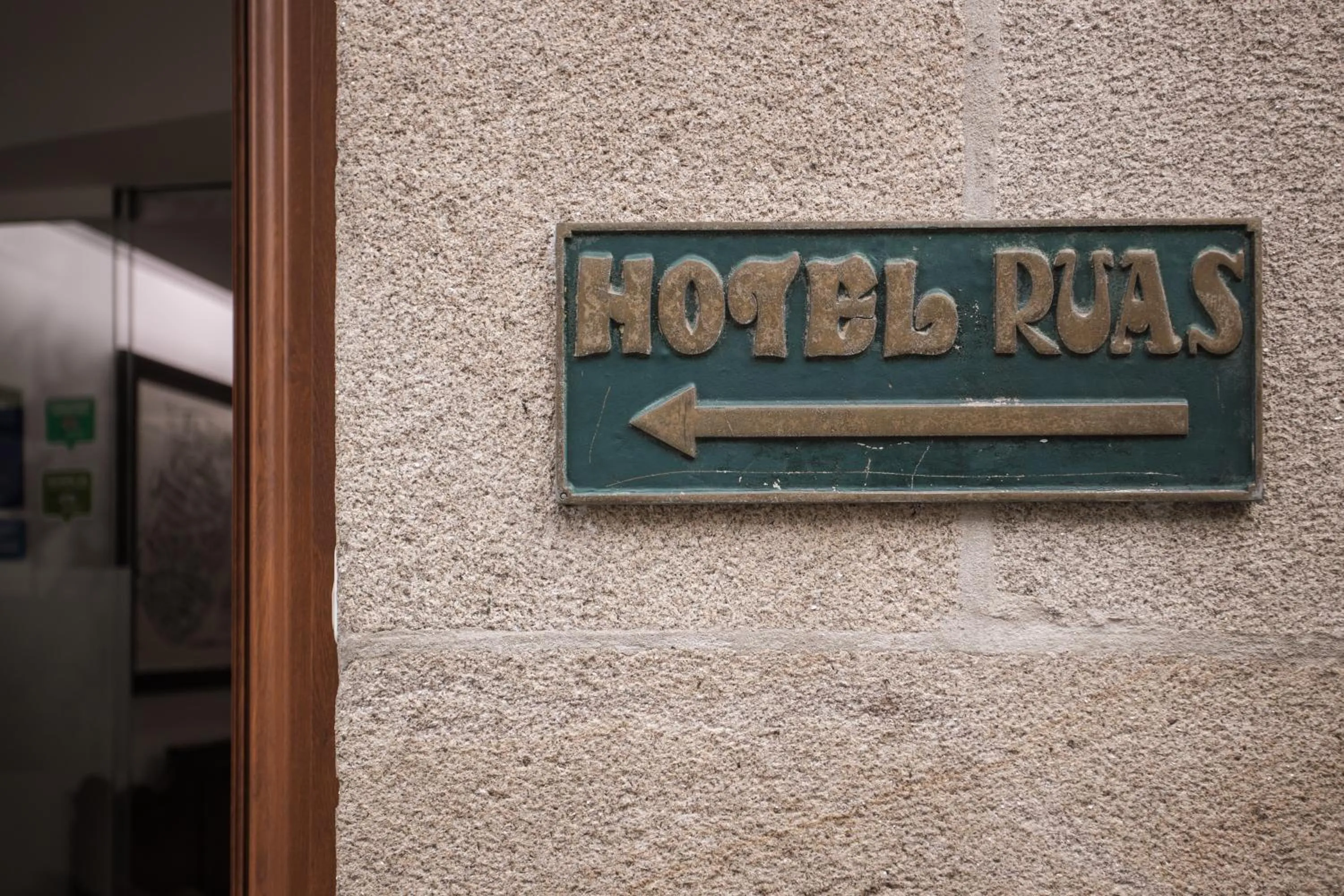 Property logo or sign in Hotel Restaurante Rúas