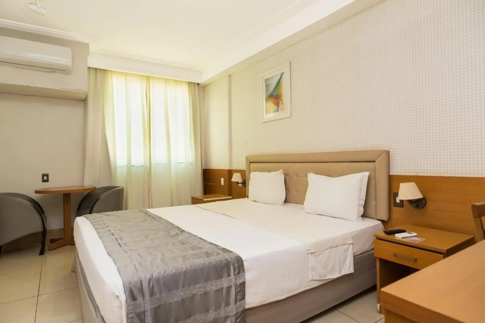 Bed in Royal Macaé Palace Hotel