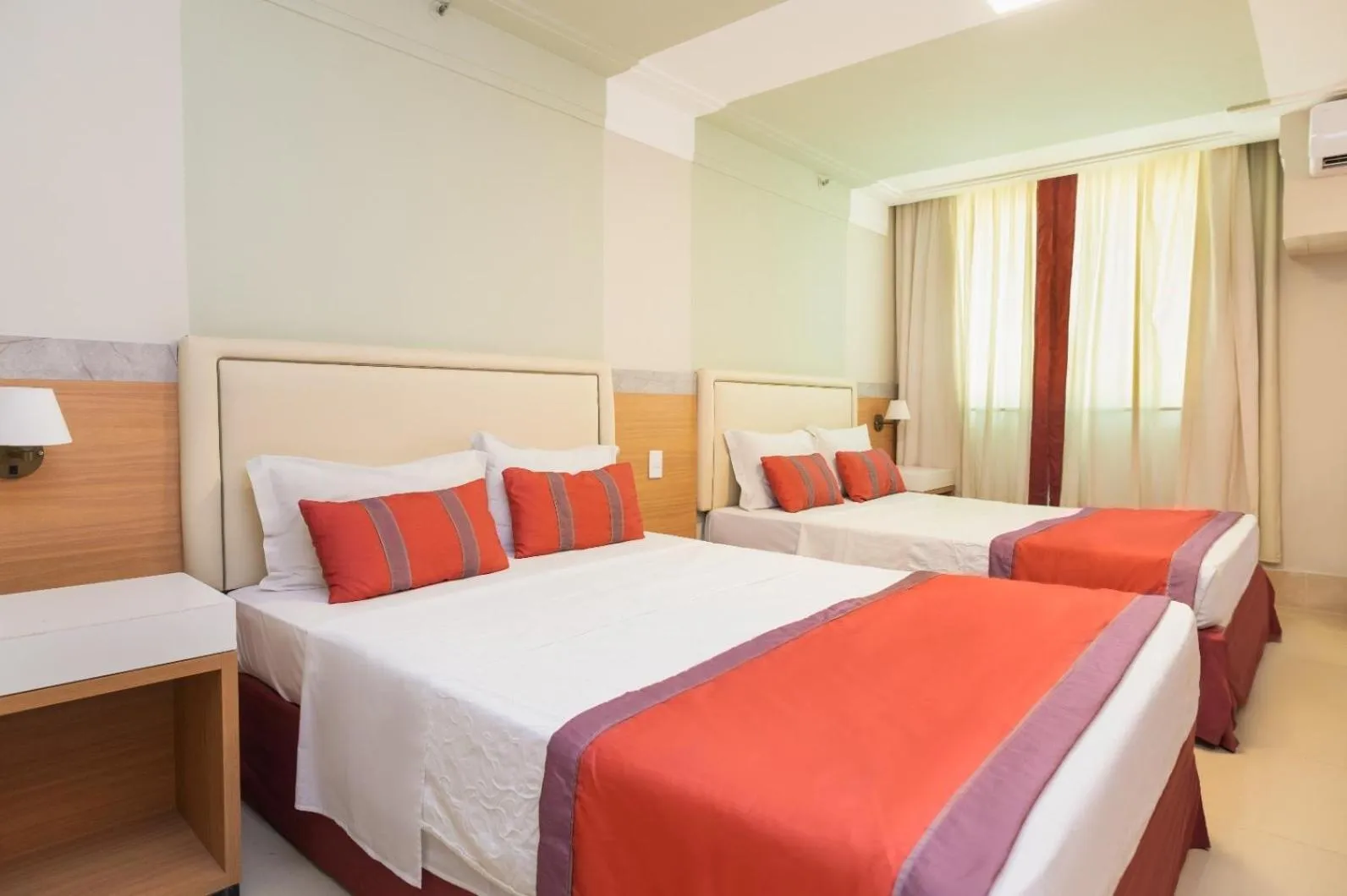 Bed in Royal Macaé Palace Hotel