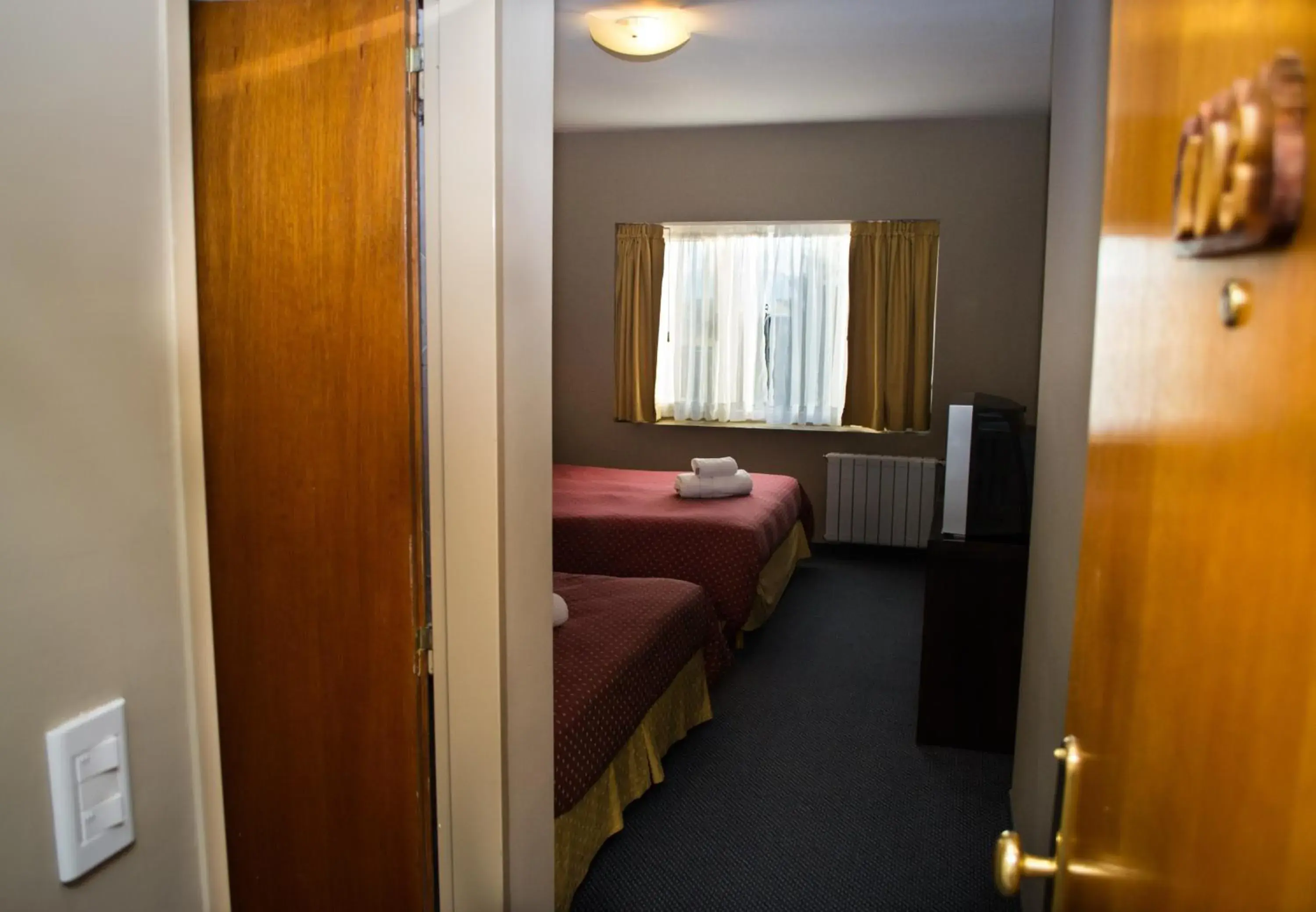 Bed in Marcopolo Suites Calafate Bed in Marcopolo Suites Calafate