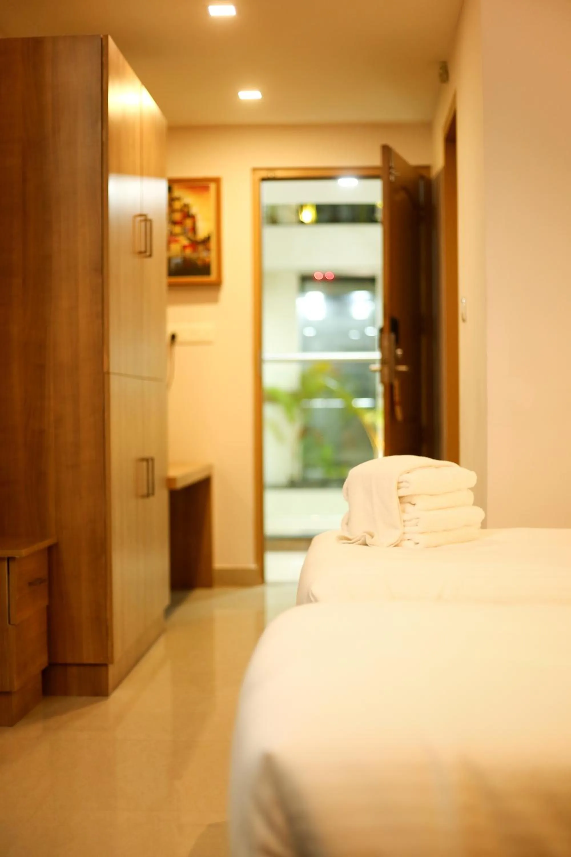 Bed in Sidra Pristine Hotel and Portico Halls