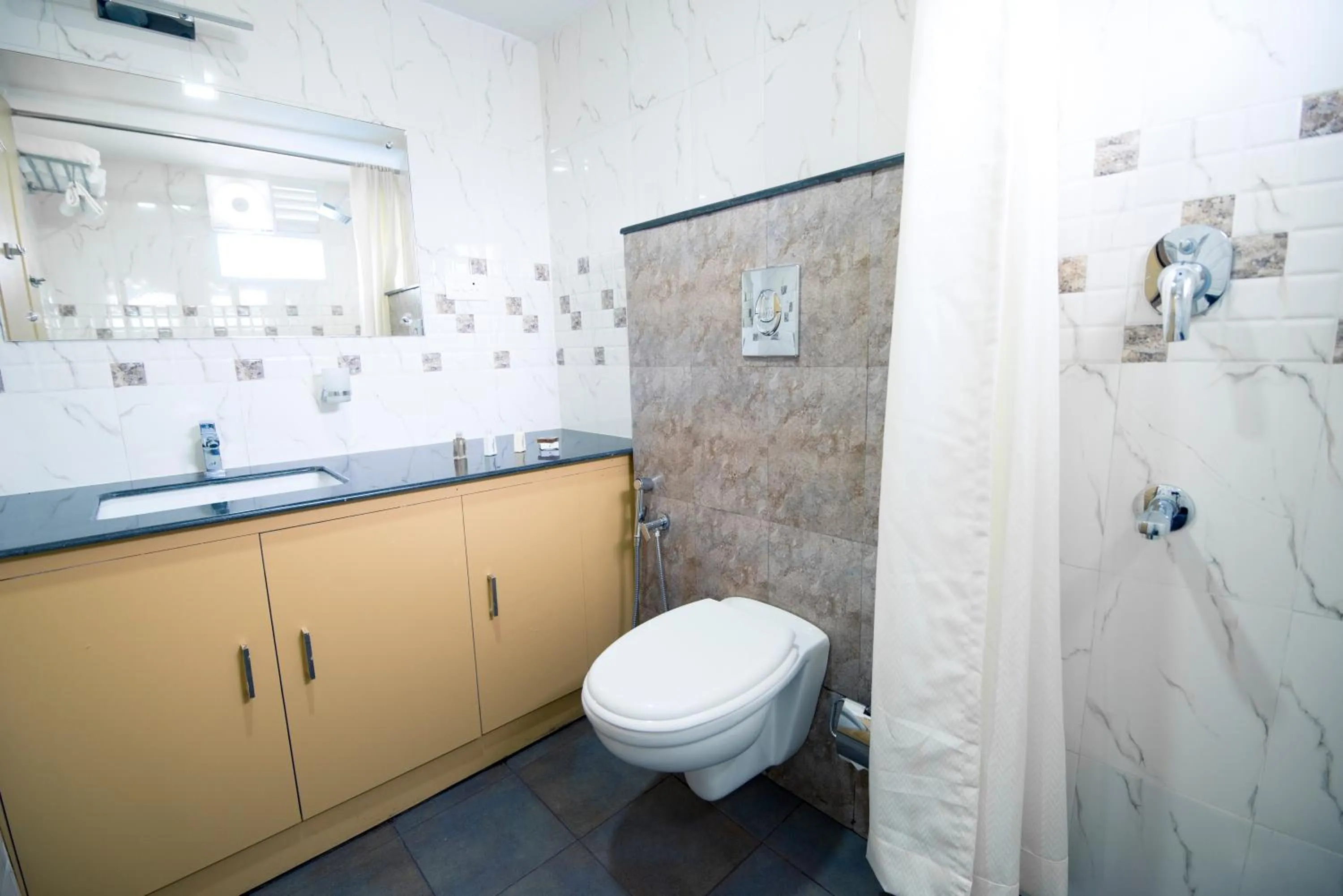 Shower in Sidra Pristine Hotel and Portico Halls