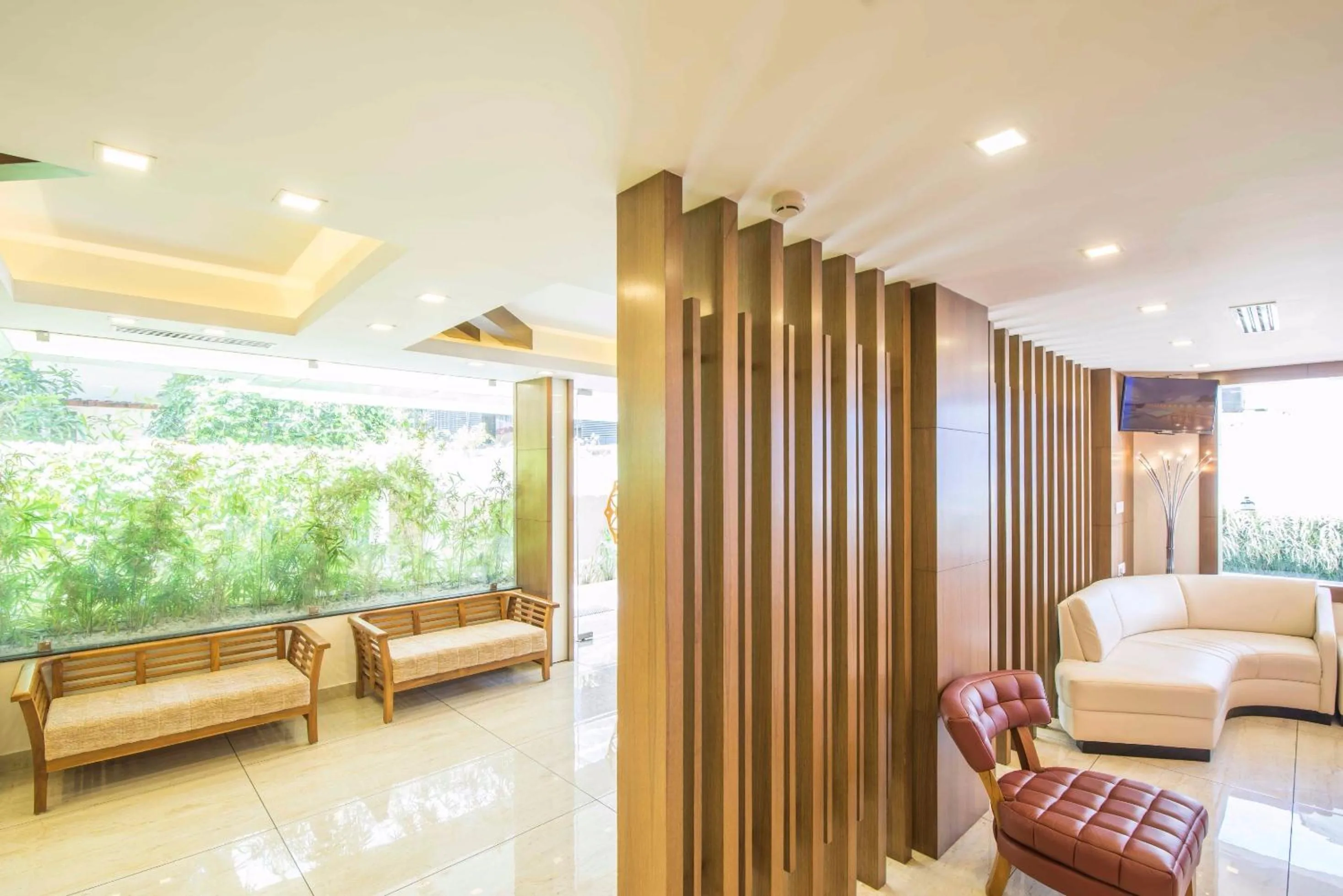 Lobby or reception, Bed in Sidra Pristine Hotel and Portico Halls