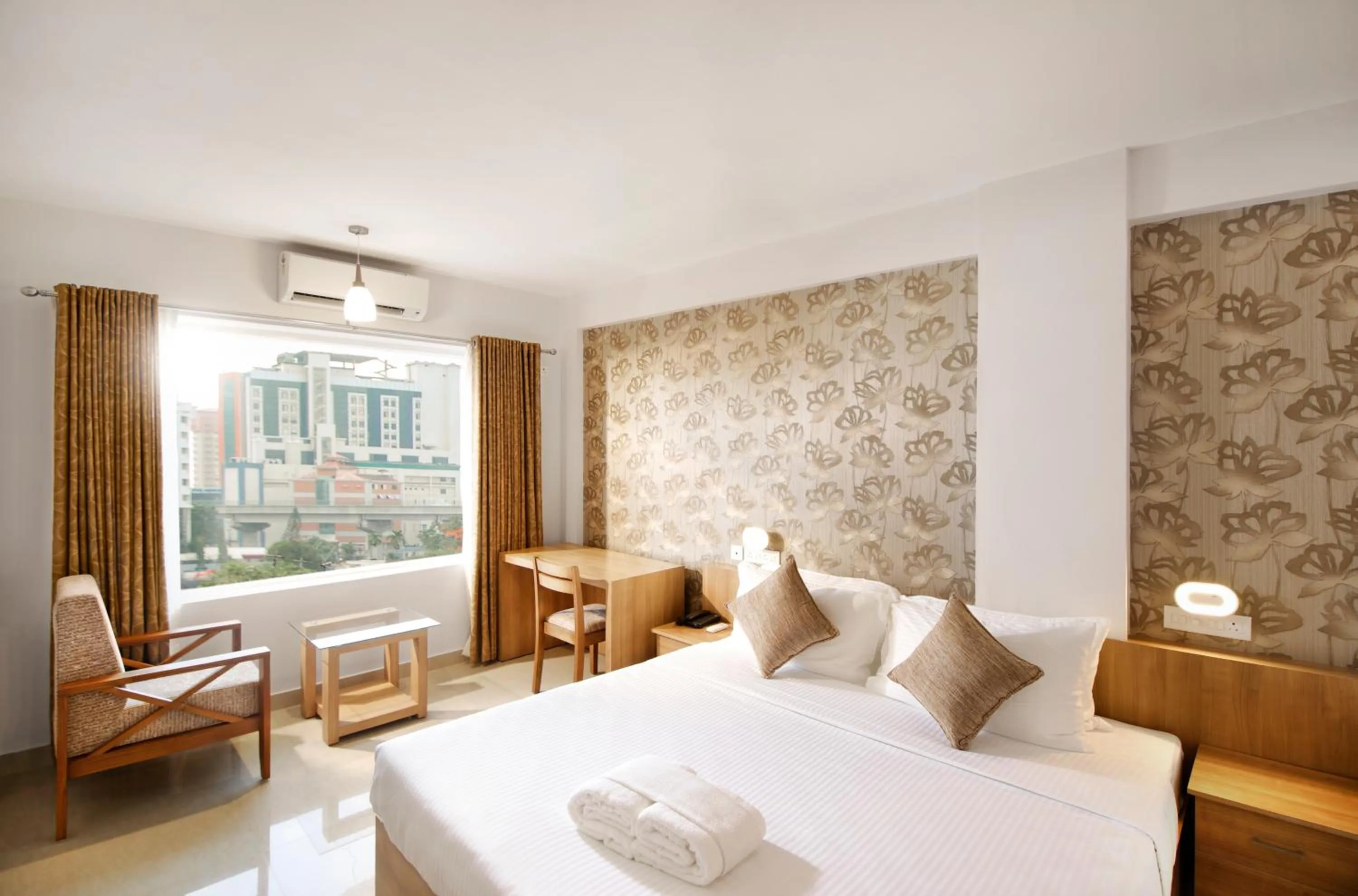 Sunrise, Bed in Sidra Pristine Hotel and Portico Halls