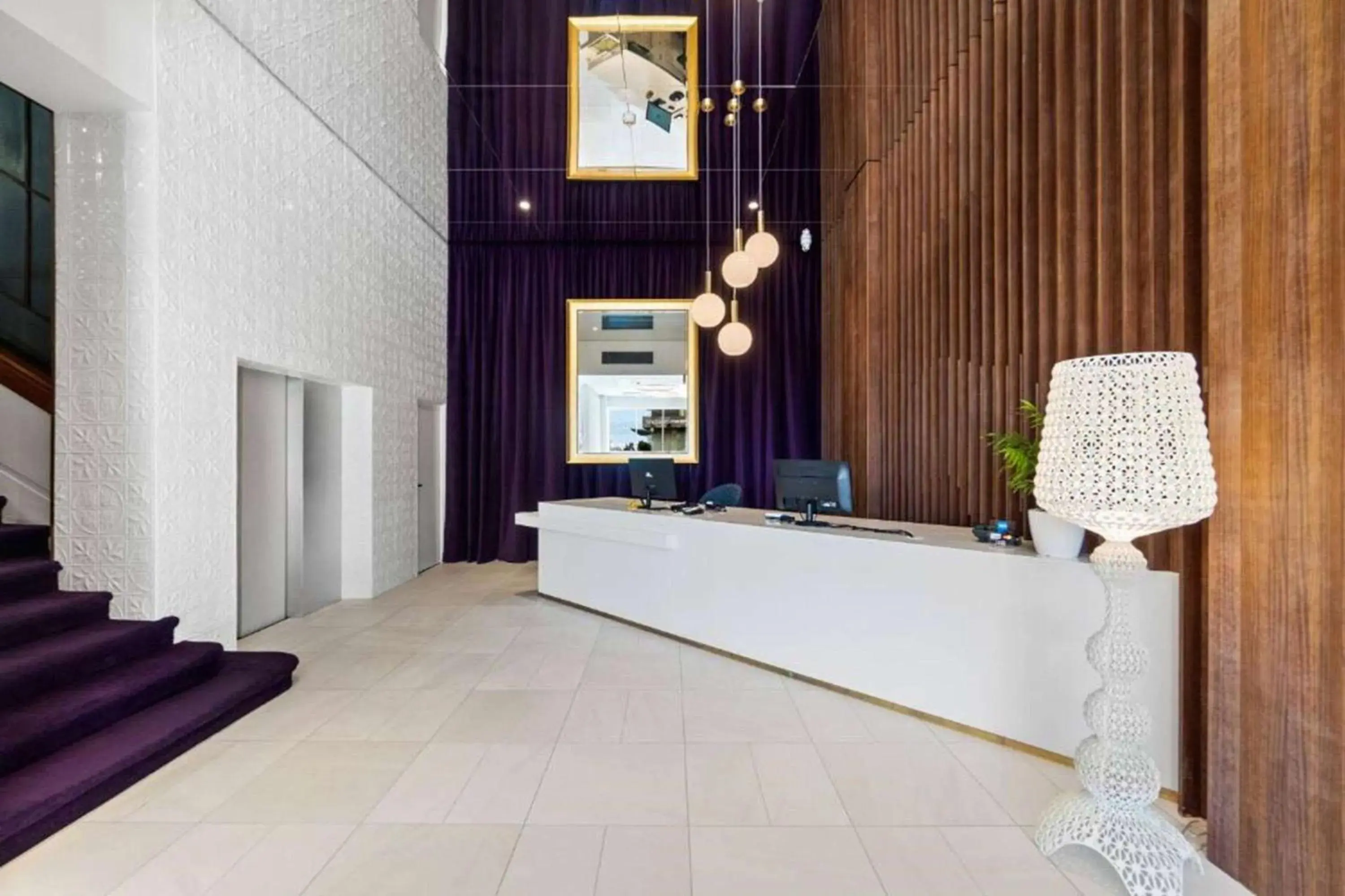 Lobby or reception in Ramada by Wyndham, Hamilton City Center Lobby or reception in Ramada by Wyndham, Hamilton City Center