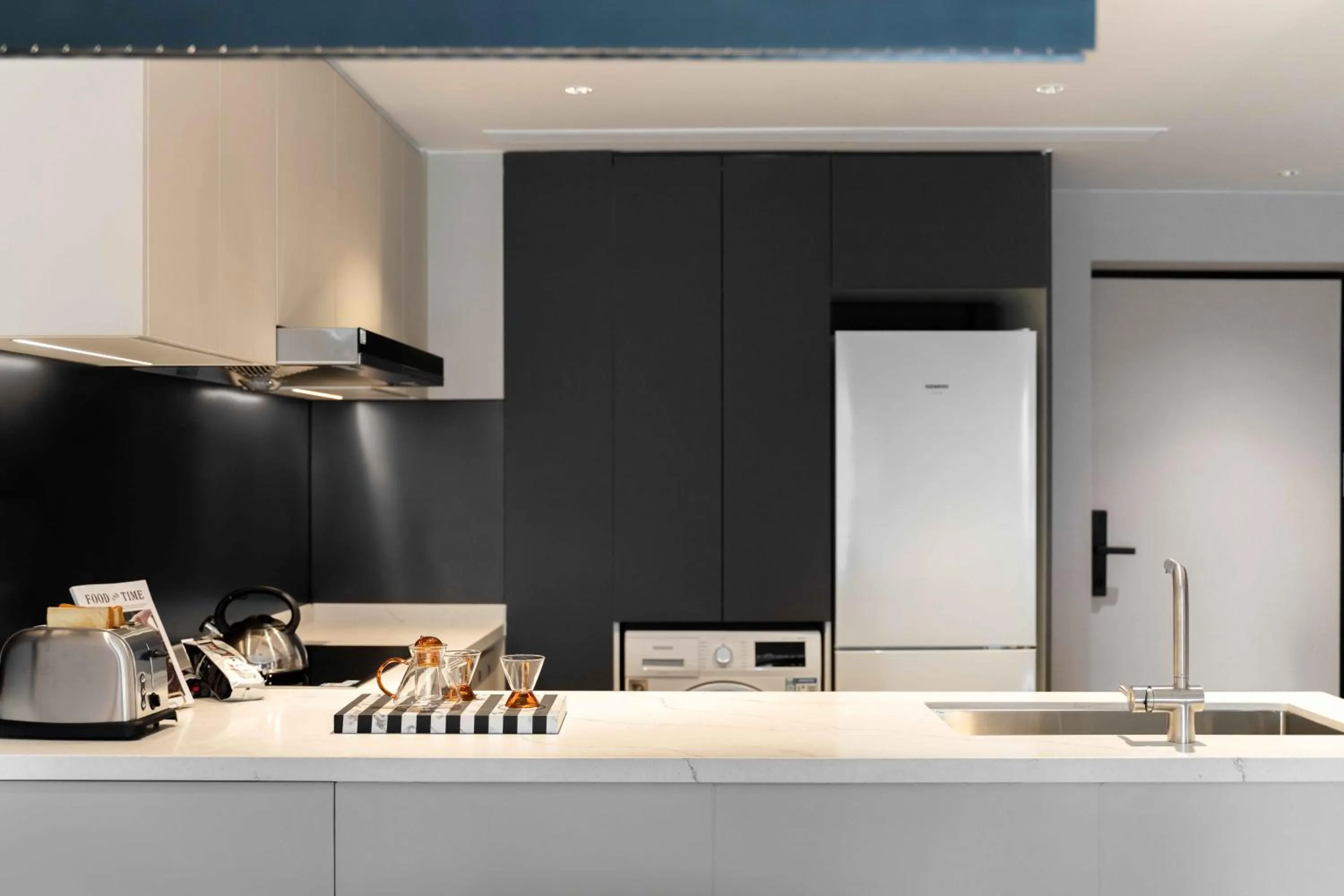 Kitchen or kitchenette in CM+ Service Apartment Shenzhen Taige