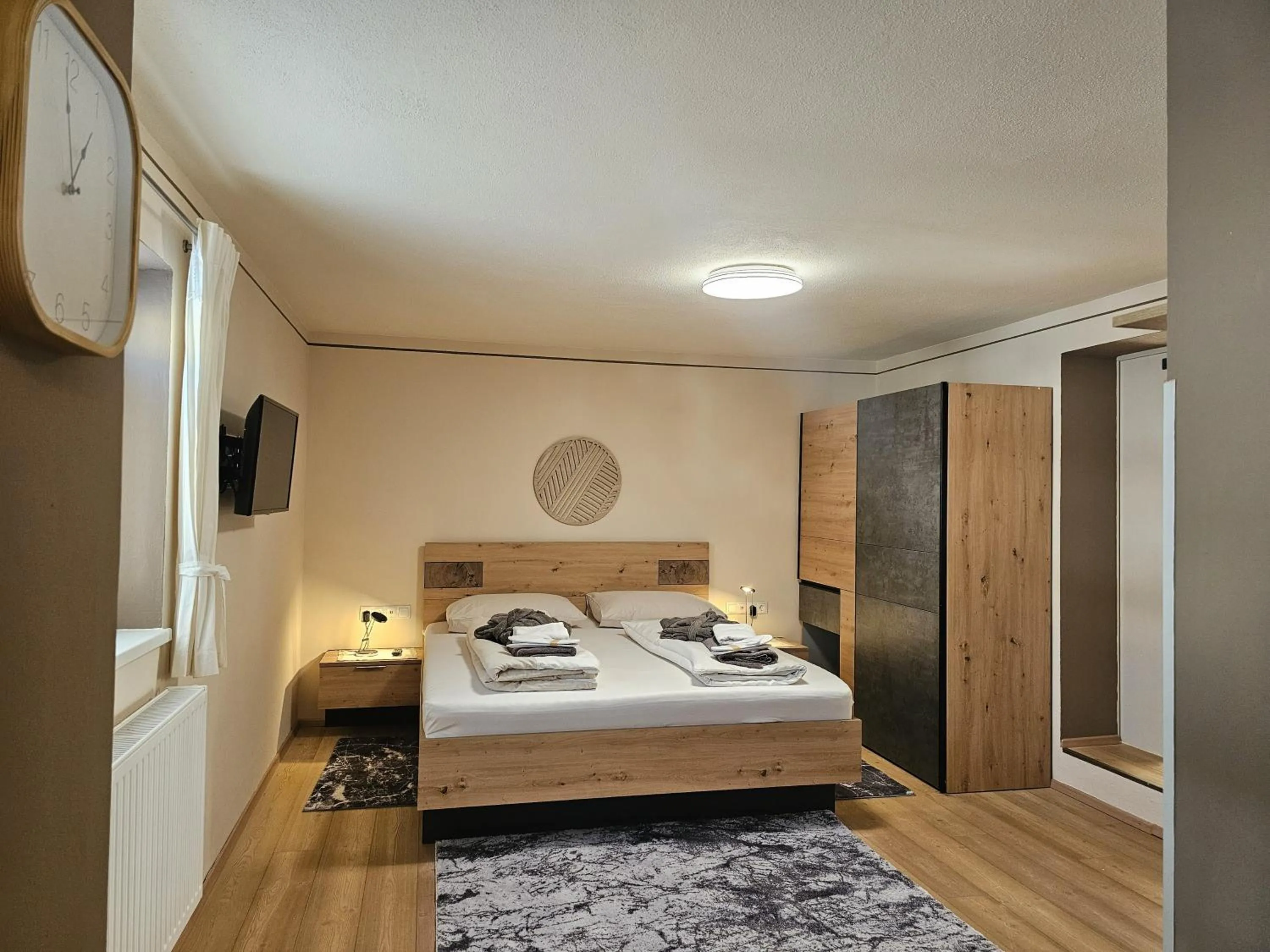 Photo of the whole room, Bed in Alpenlandhaus Menardi