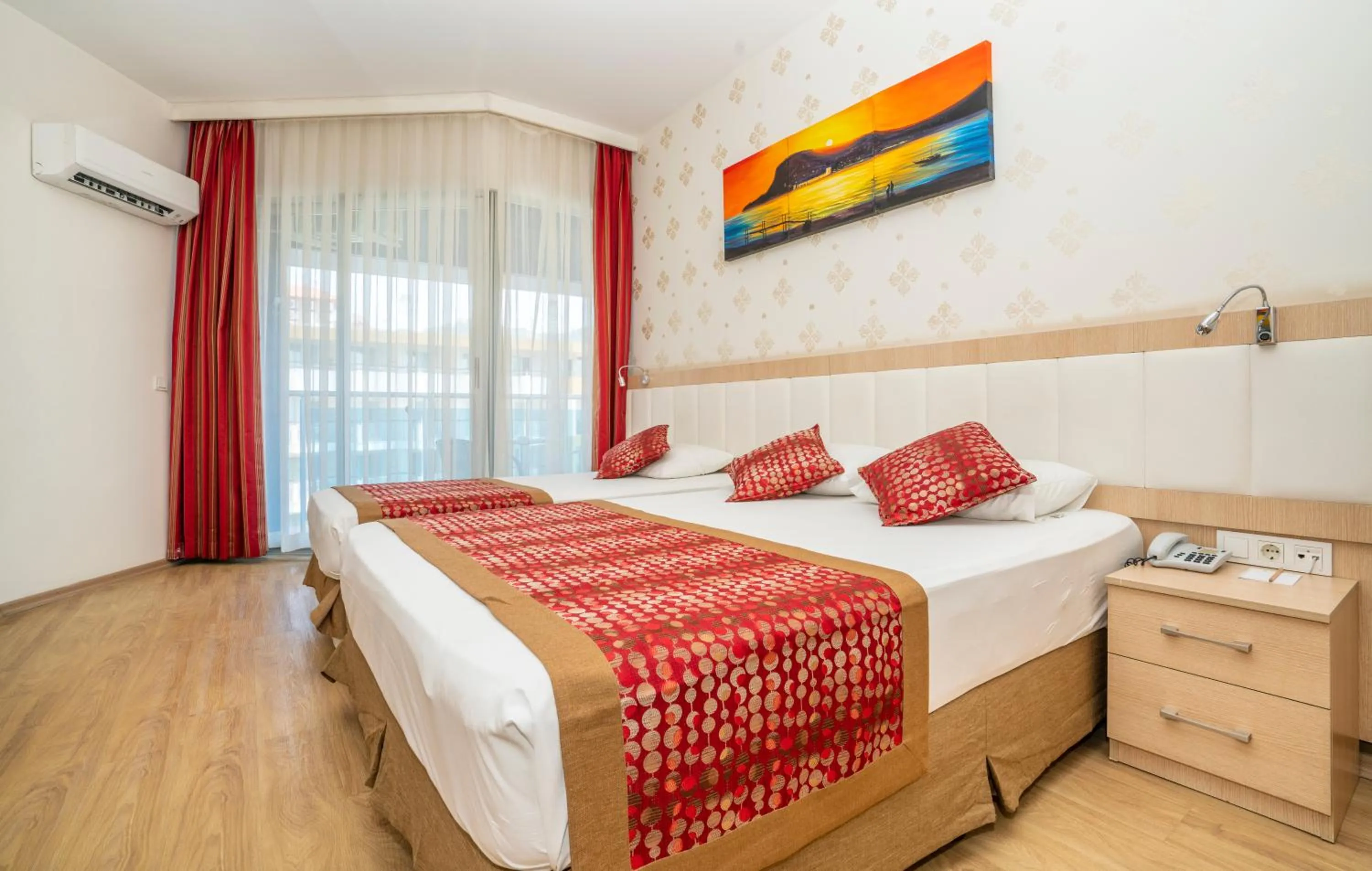 Bed in Gardenia Hotel