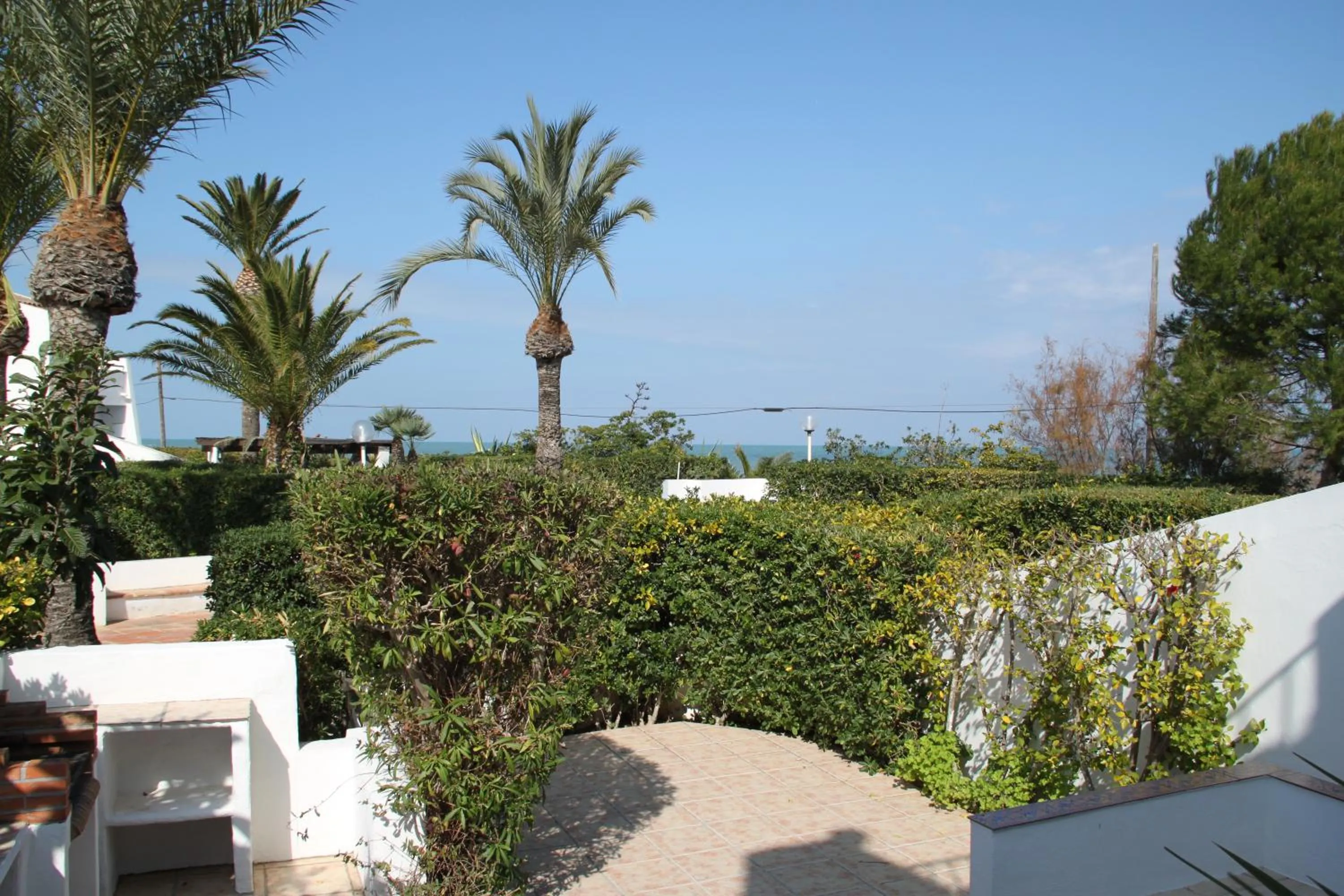 Day in Meerblick & Pool! Traumhaftes Reihenhaus am Strand