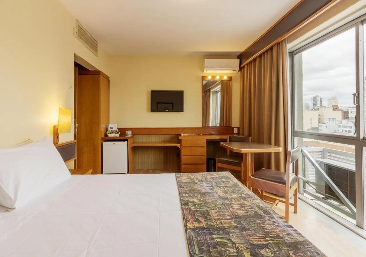 Communal lounge/ TV room, Bed in Ritter Hotéis