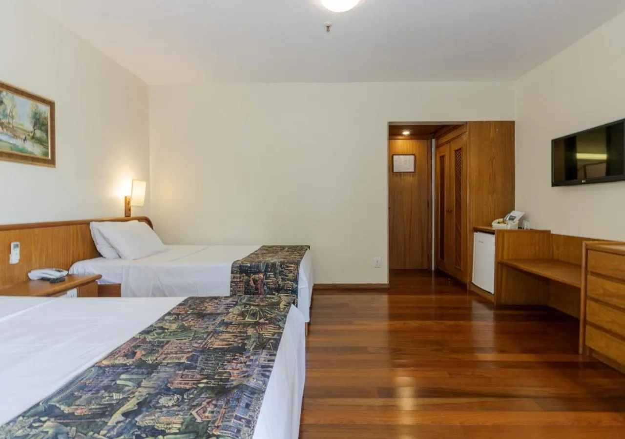 Communal lounge/ TV room, Bed in Ritter Hotéis