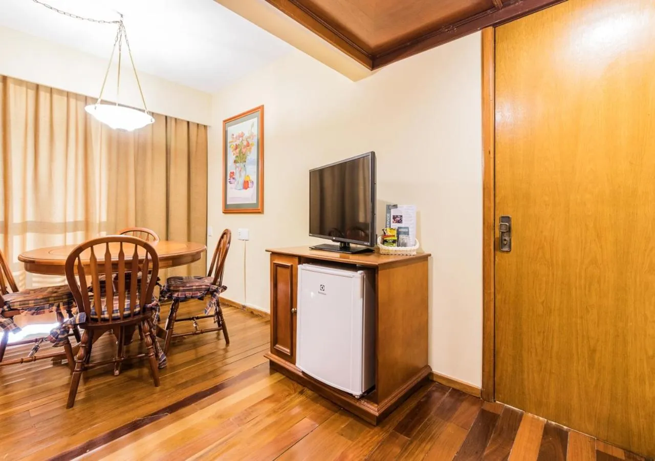 Communal lounge/ TV room in Ritter Hotéis