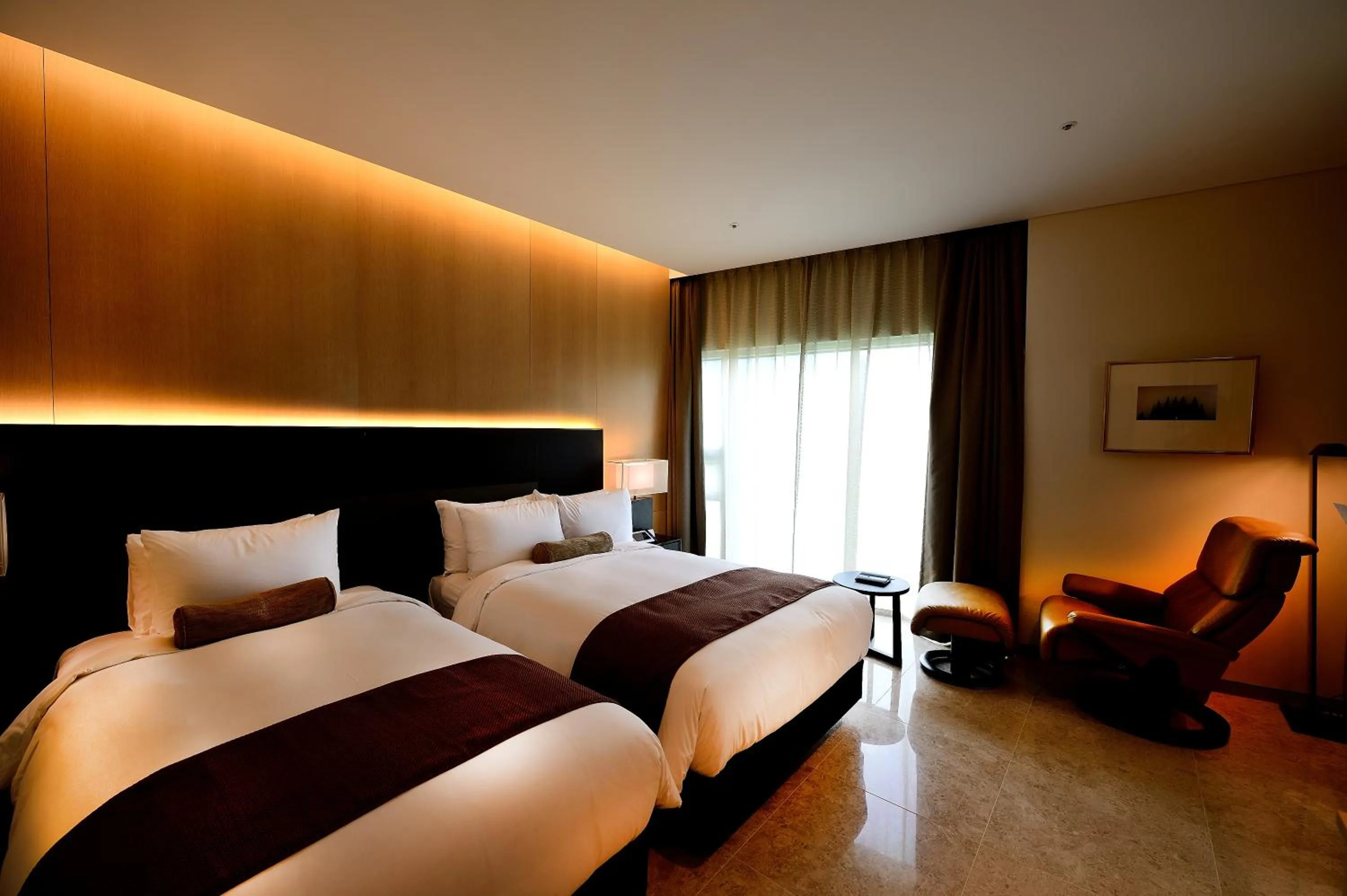 Bed in Midas Hotel & Resort