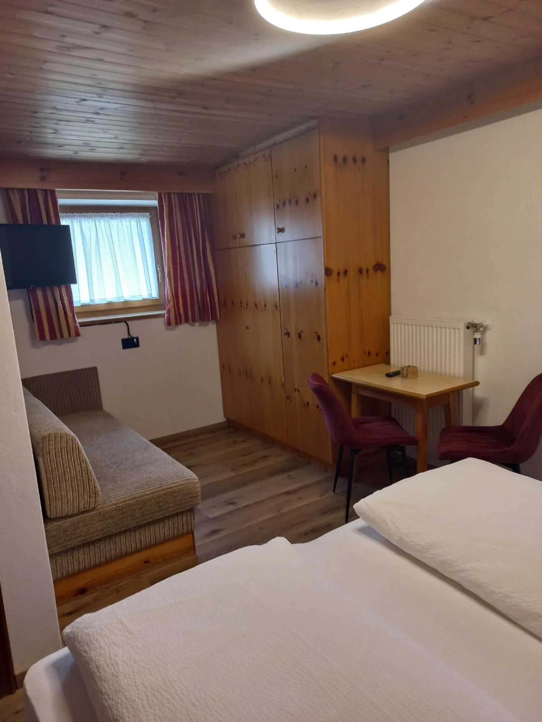 Bed in Garnì Piz da L'Ander