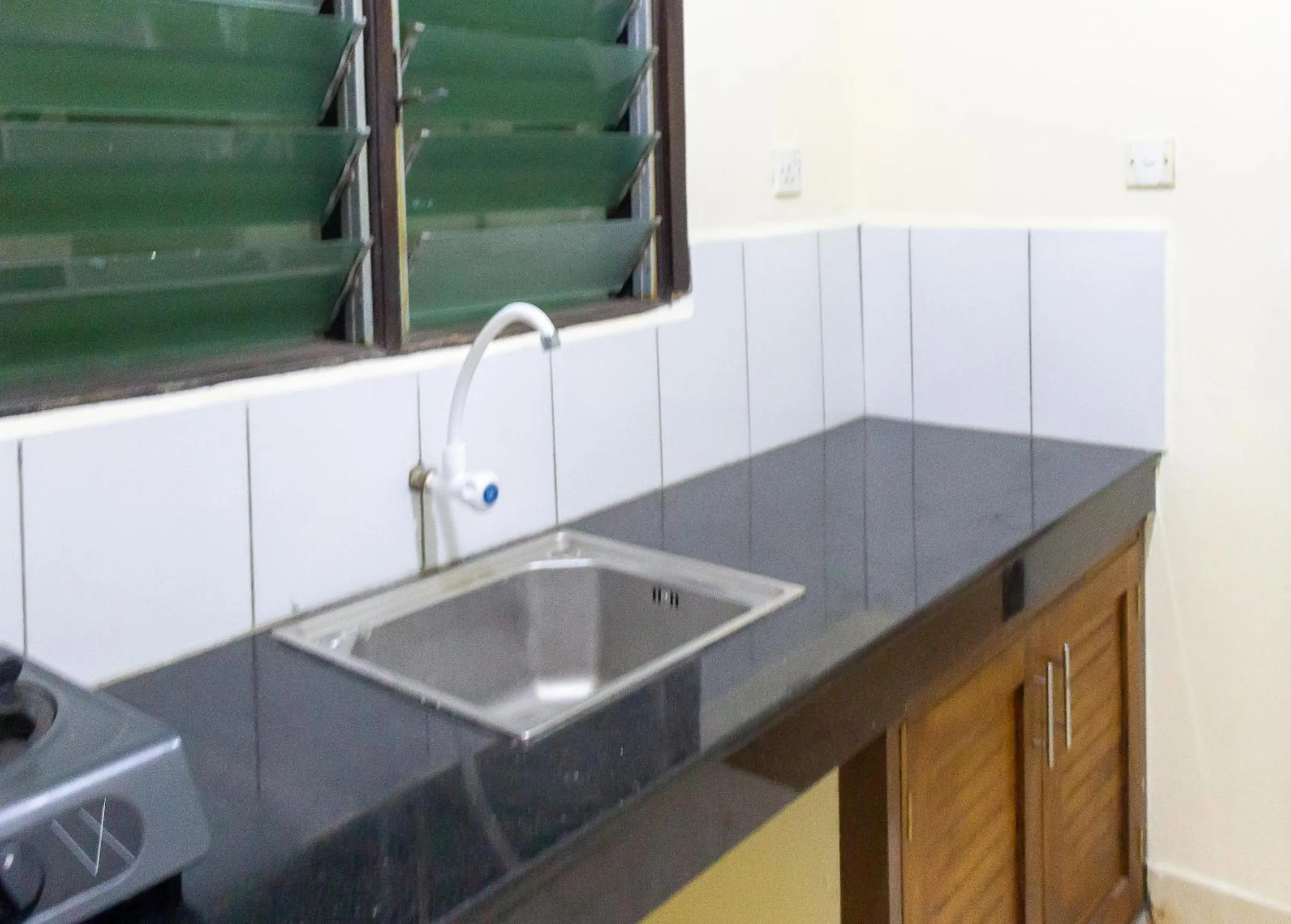 kitchen in Merry Villa Hotel & Apartments