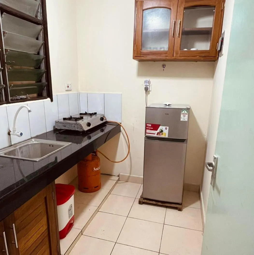 kitchen in Merry Villa Hotel & Apartments