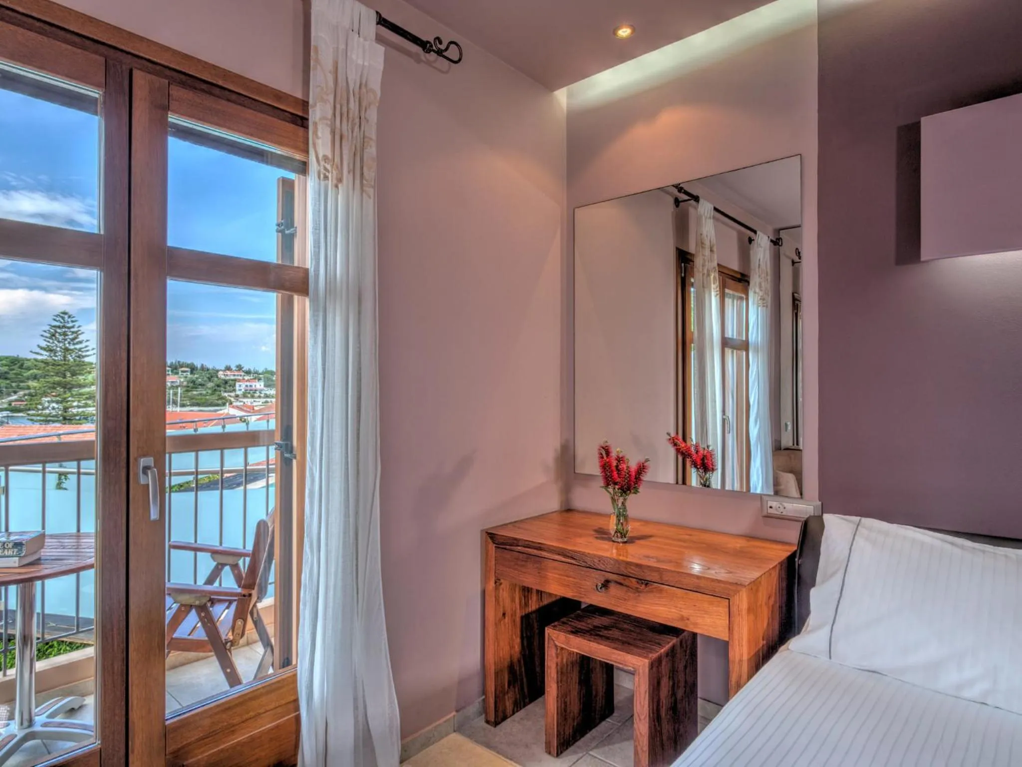 Pool view, Bed in Fiscardo Bay Hotel