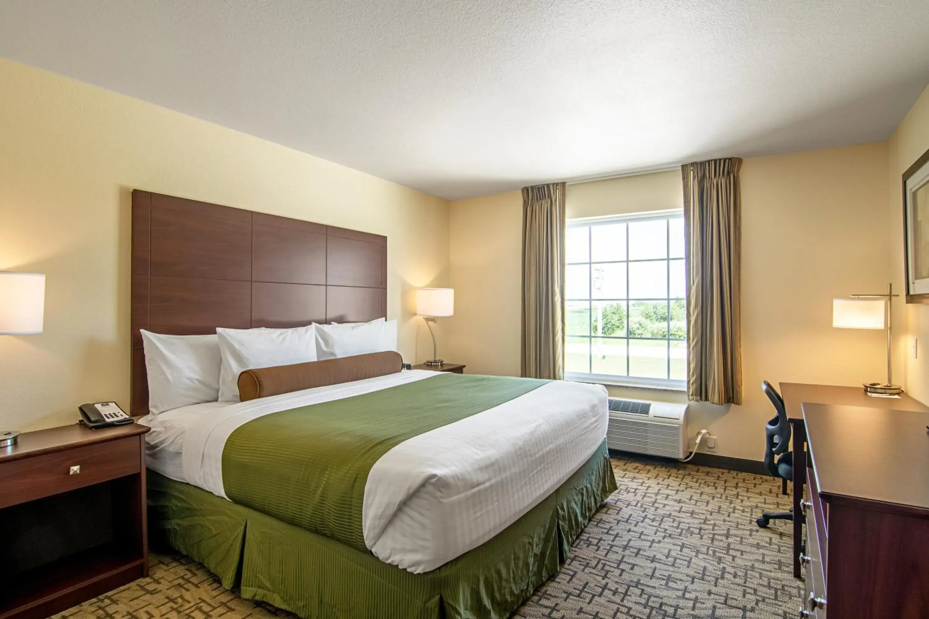 Bed in Cobblestone Hotel & Suites - Paxton Bed in Cobblestone Hotel & Suites - Paxton