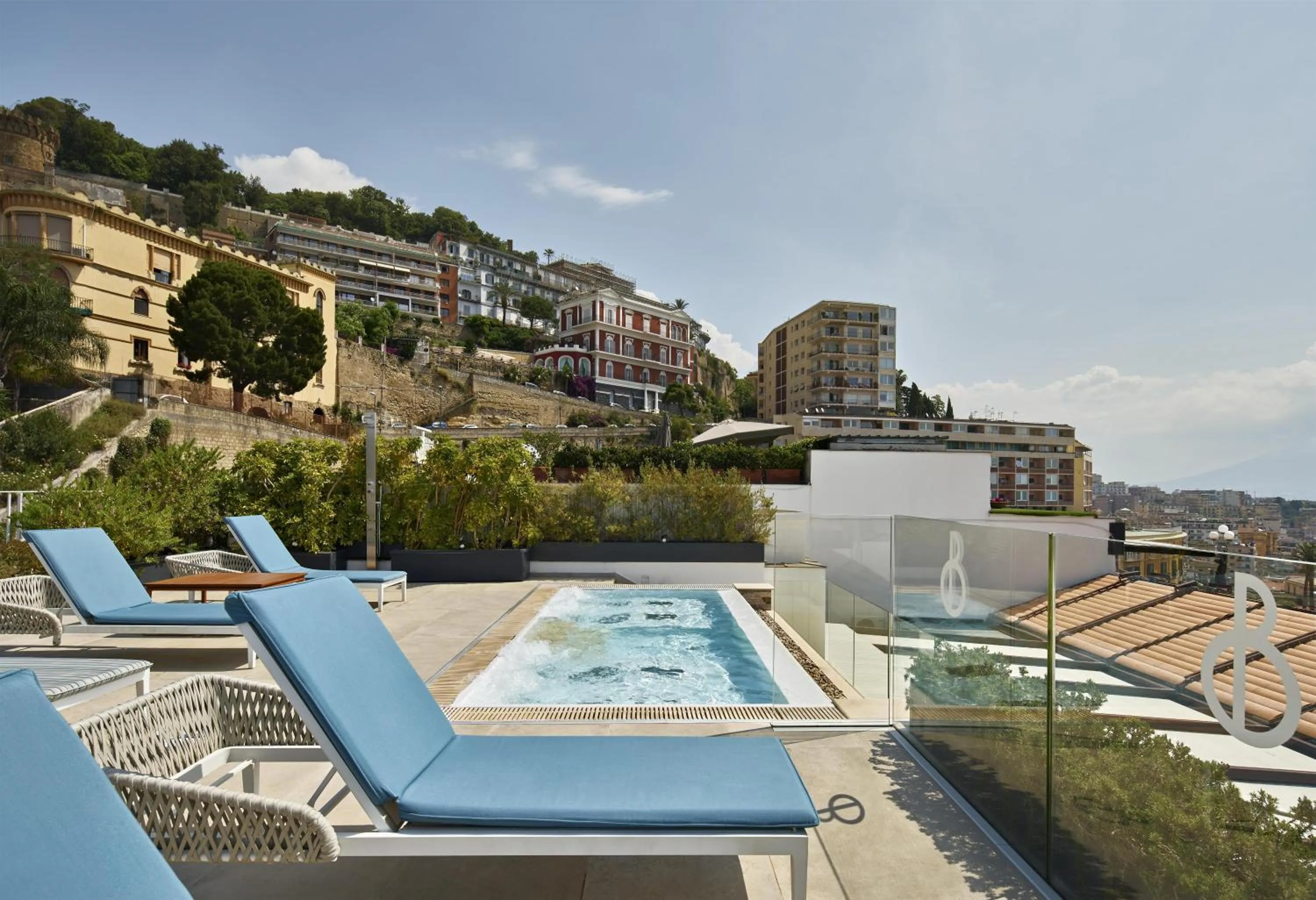 Pool view in De Bonart Naples, Curio Collection By Hilton