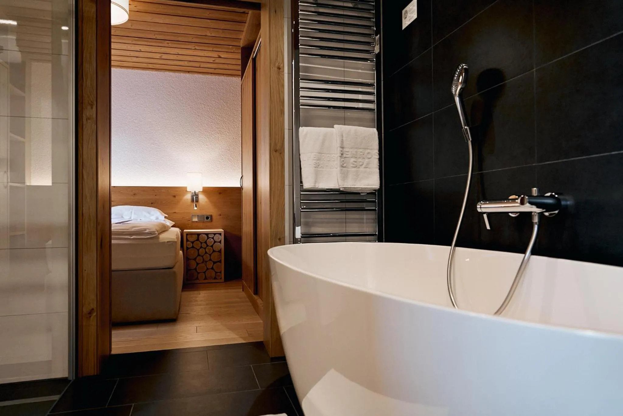 Bathroom, Bed in Aktiv & Spa Hotel Alpenrose