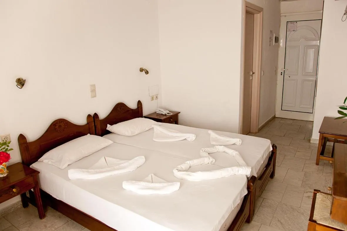 Bed in Anatoli Beach Hotel
