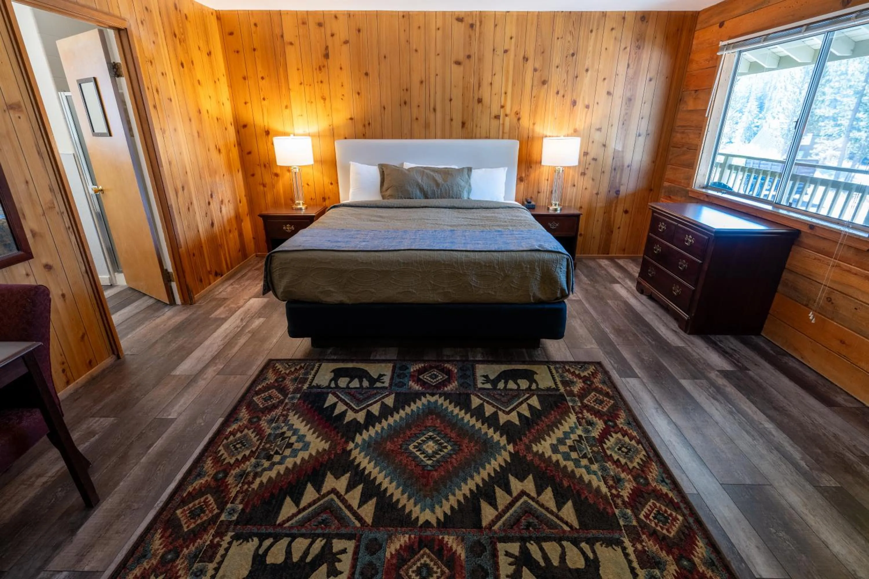 Bed in The Tamarack Lodge