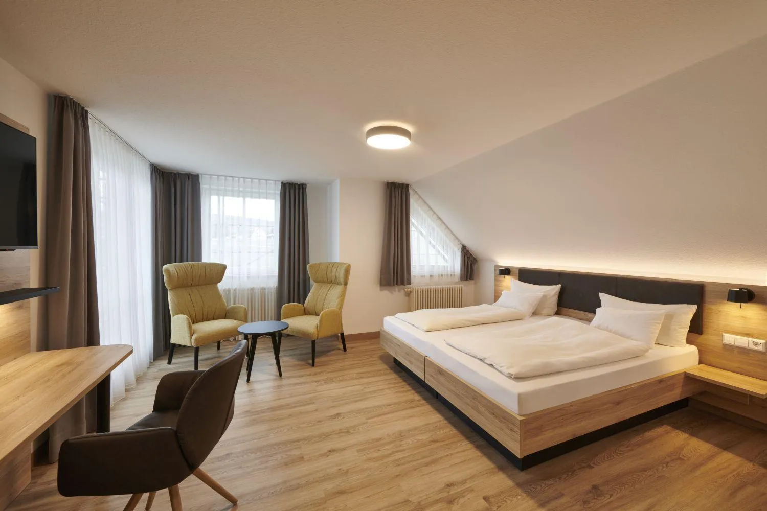 Photo of the whole room, Bed in Kreuz-Post Hotel-Restaurant-SPA