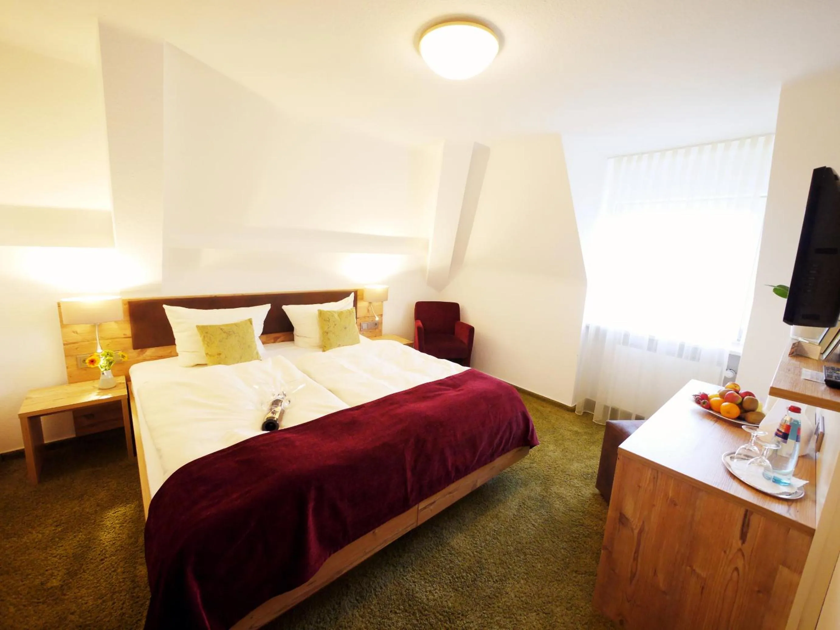 Photo of the whole room, Bed in Kreuz-Post Hotel-Restaurant-SPA