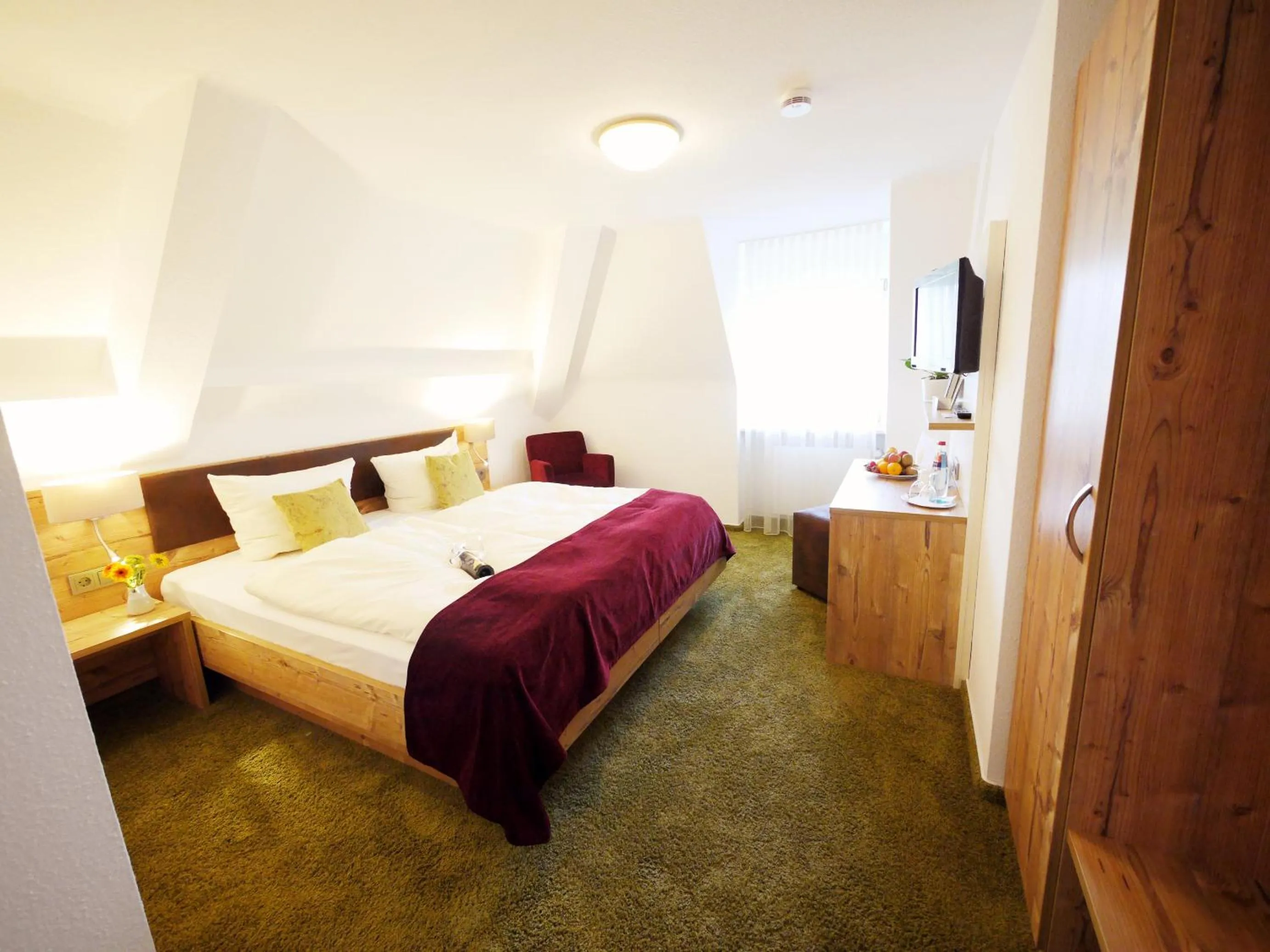 Photo of the whole room, Bed in Kreuz-Post Hotel-Restaurant-SPA
