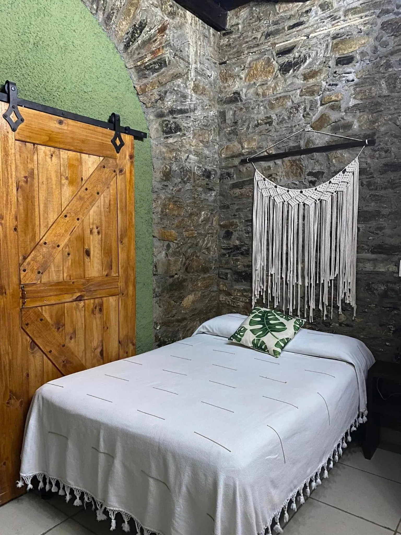 fireplace, Bed in Grann Posada Xilitla