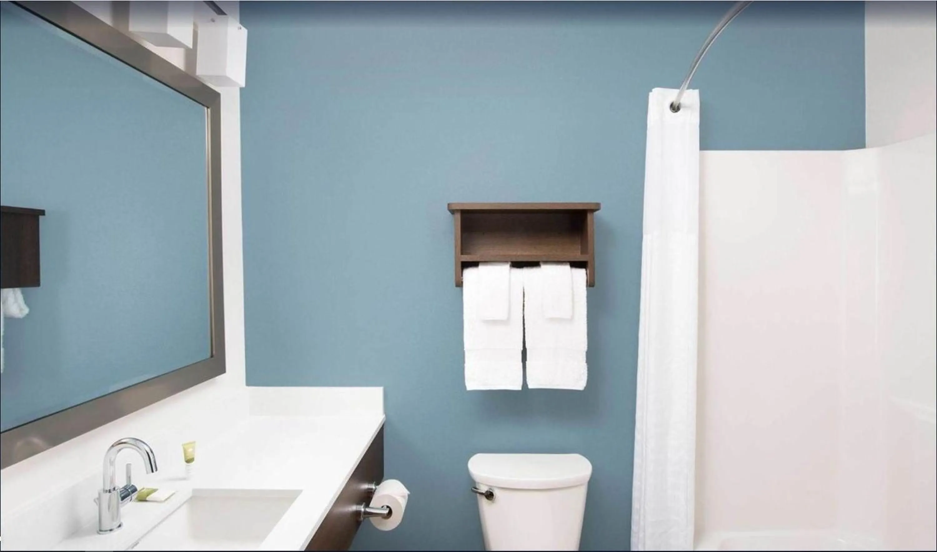 Bathroom in WoodSpring Suites Plano - North Dallas