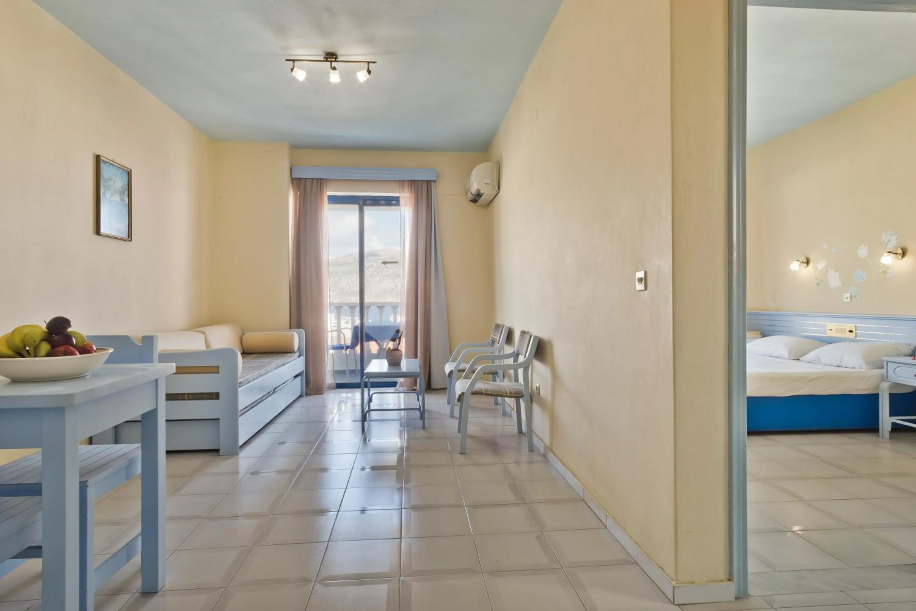 Bed in Regina Studios & Hotel